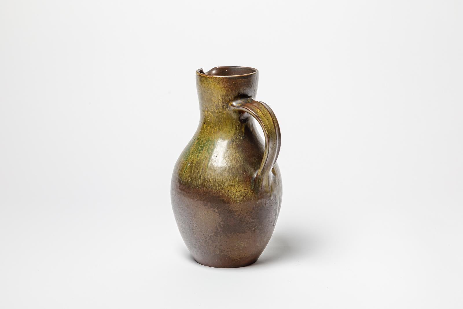 Brown and green glazed ceramic pitcher by Roger Jacques, circa 1960-1970. In Good Condition For Sale In Saint-Ouen, FR