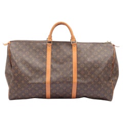 Brown and tan monogram coated canvas Louis Vuitton Keepall 60 with gold-tone 
