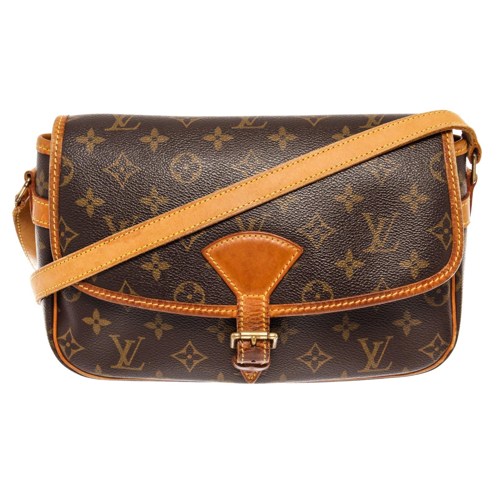 Brown and tan monogram coated canvas Louis Vuitton Sologne bag with brass
