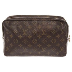 Brown and tan monogram coated canvas Louis Vuitton Toiletry 28 cm pouch bag 