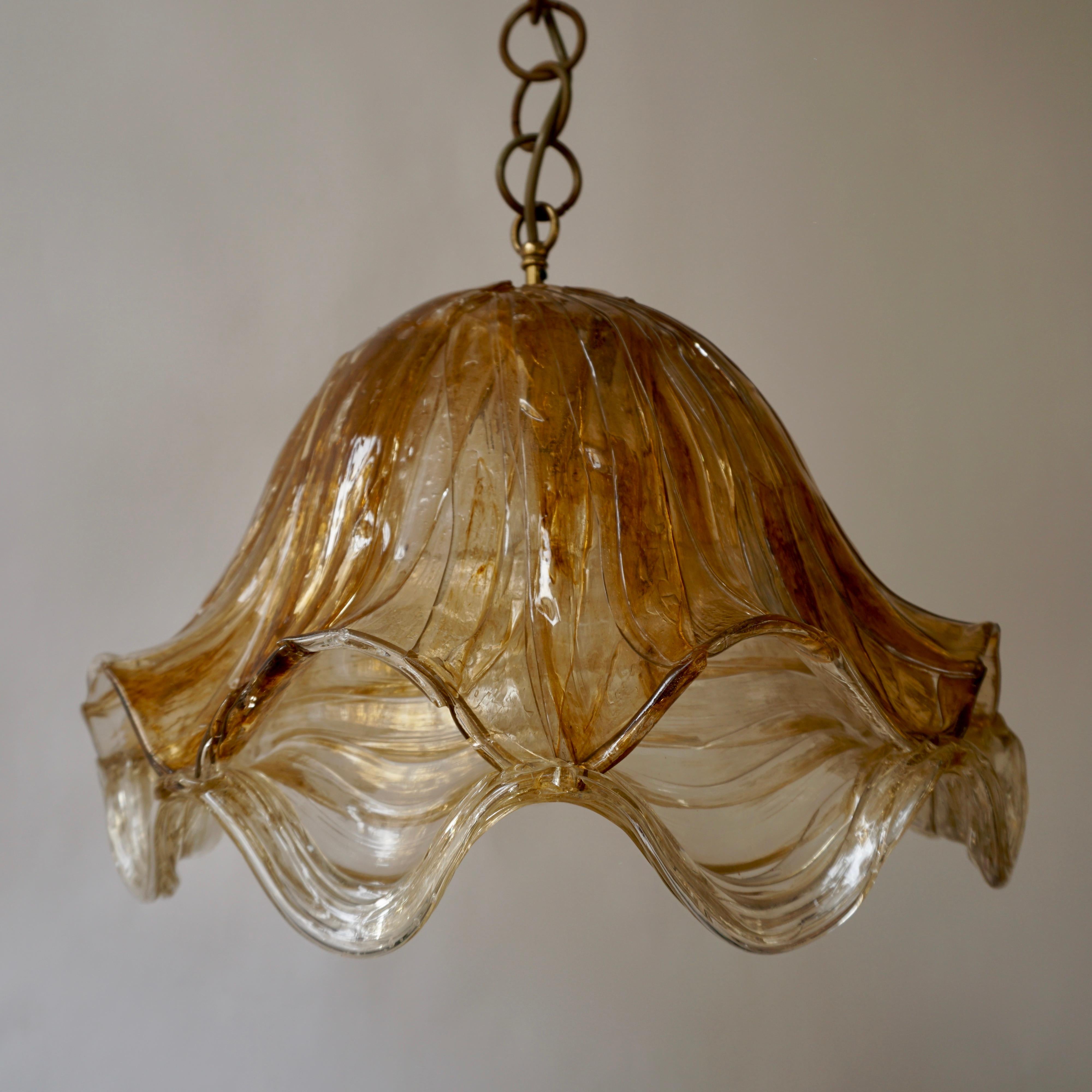 Brown and transparent acrylic ceiling light, 1970s.
Measures: Diameter 44 cm.
Height fixture 33 cm.
Total height including the chain and canopy 110 cm.