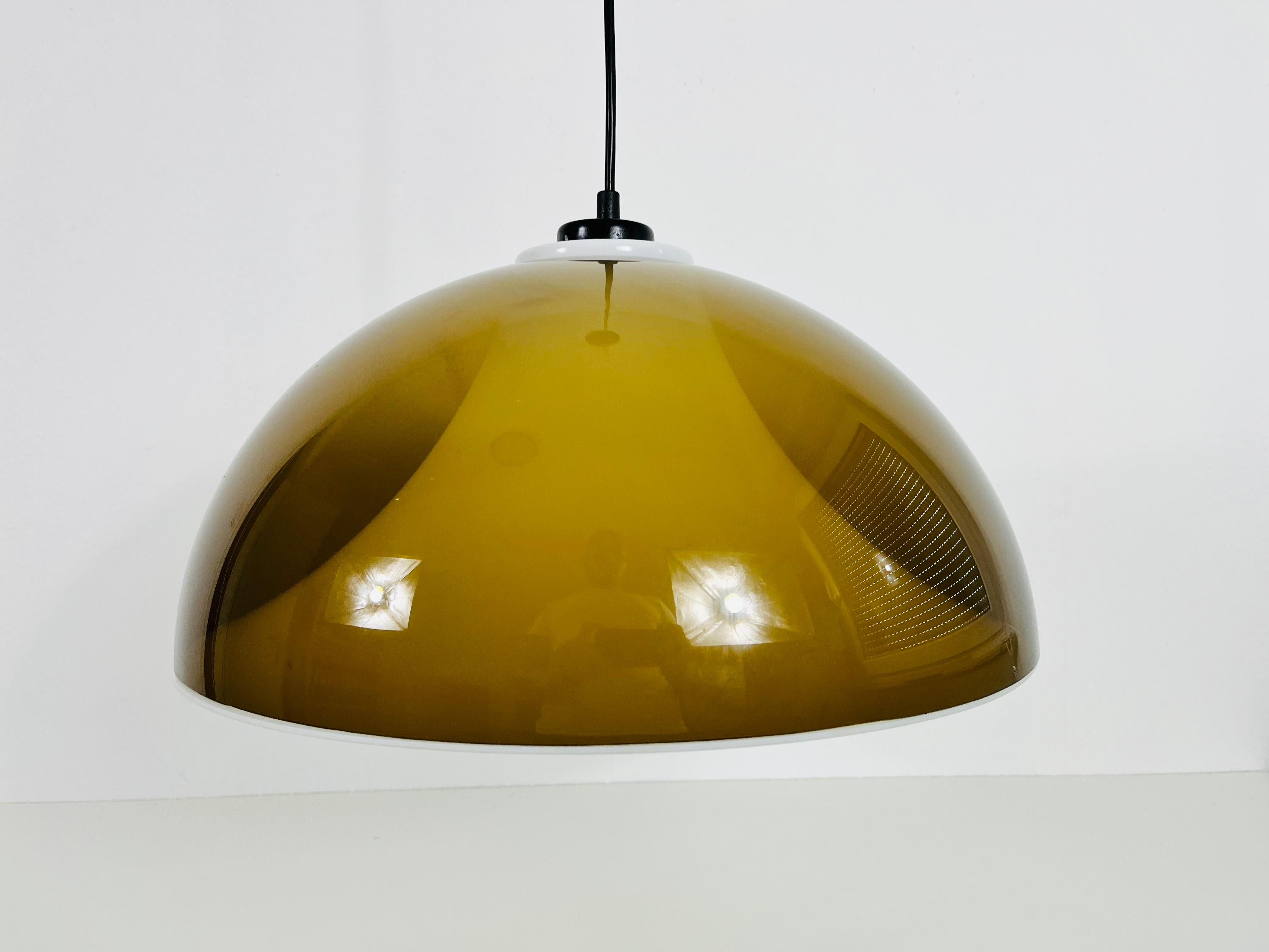 Vintage pendant lamp by Temde in the 1970s. It is made from acrylic glass and plastic.

Measures: height 23-90 cm

Diameter 45 cm 

The light requires one E27 light bulb. Works with both 120/220V. Good vintage condition.

Free worldwide