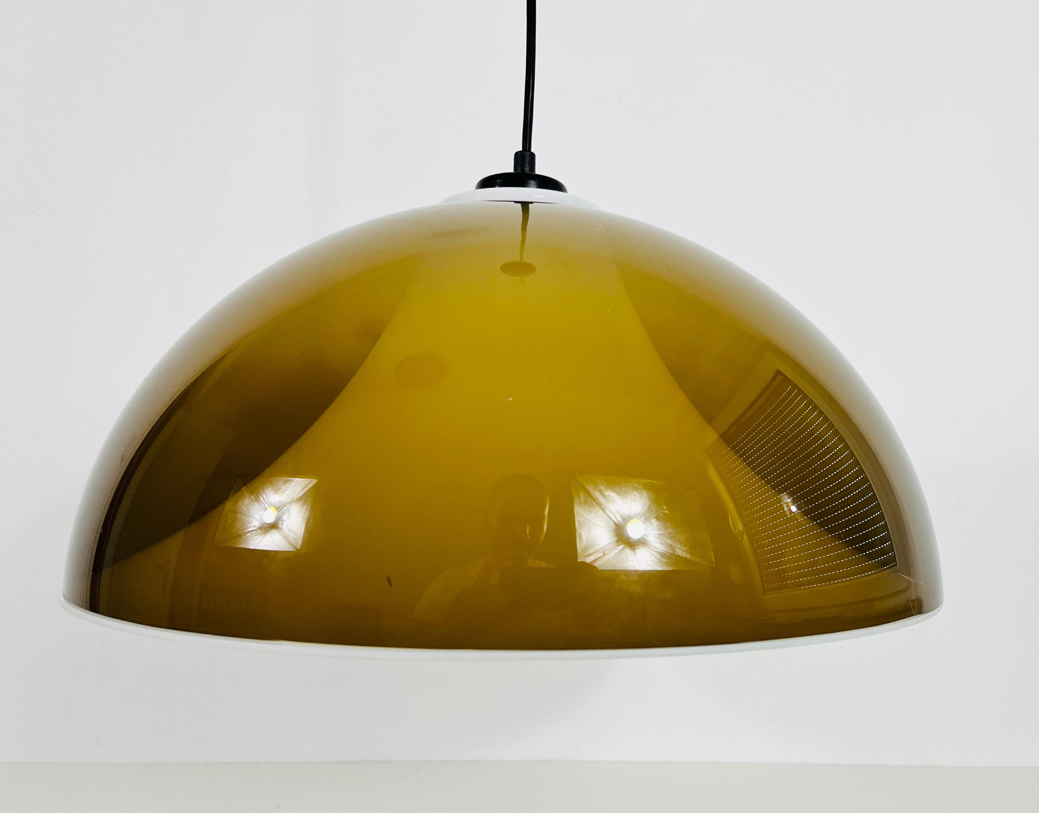 Swiss Brown and White Acrylic Glass Pendant Lamp in the Style Temde, 1970s For Sale