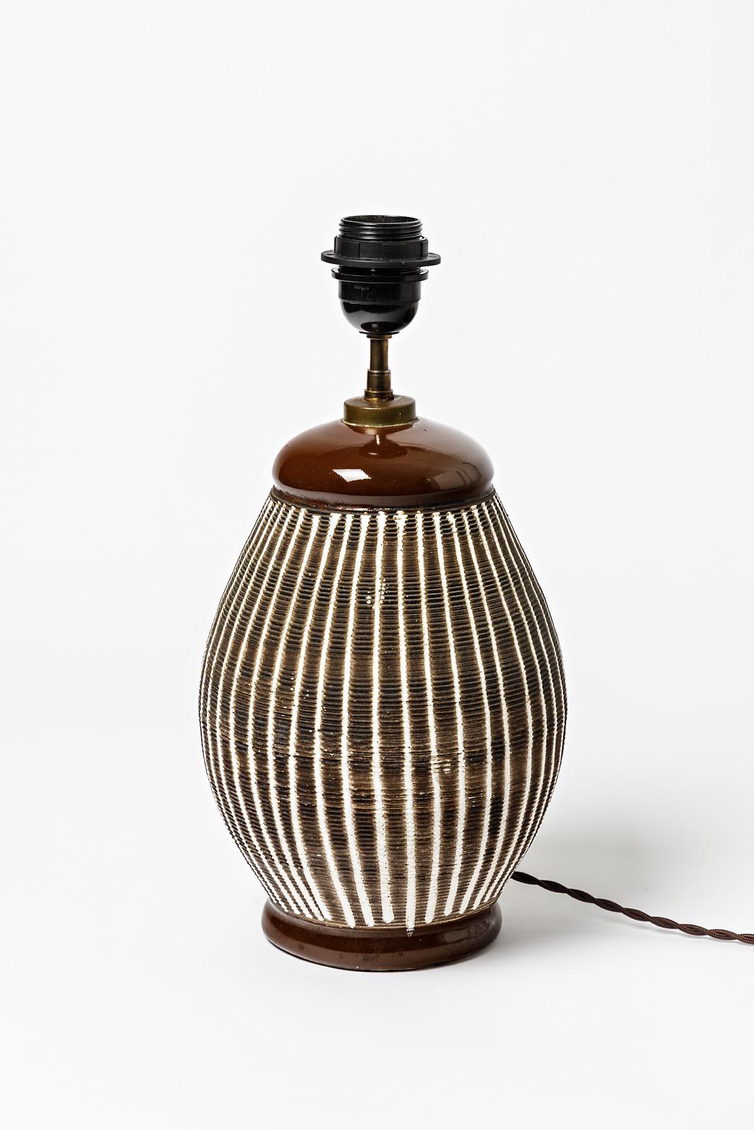 French Brown and white glazed ceramic table lamp in the style of Jean Besnard, 1930