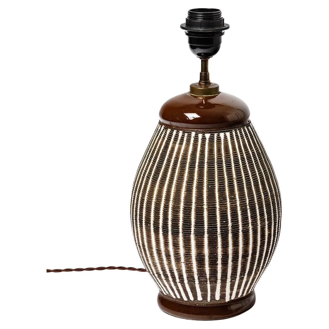 Brown and white glazed ceramic table lamp in the style of Jean Besnard, 1930