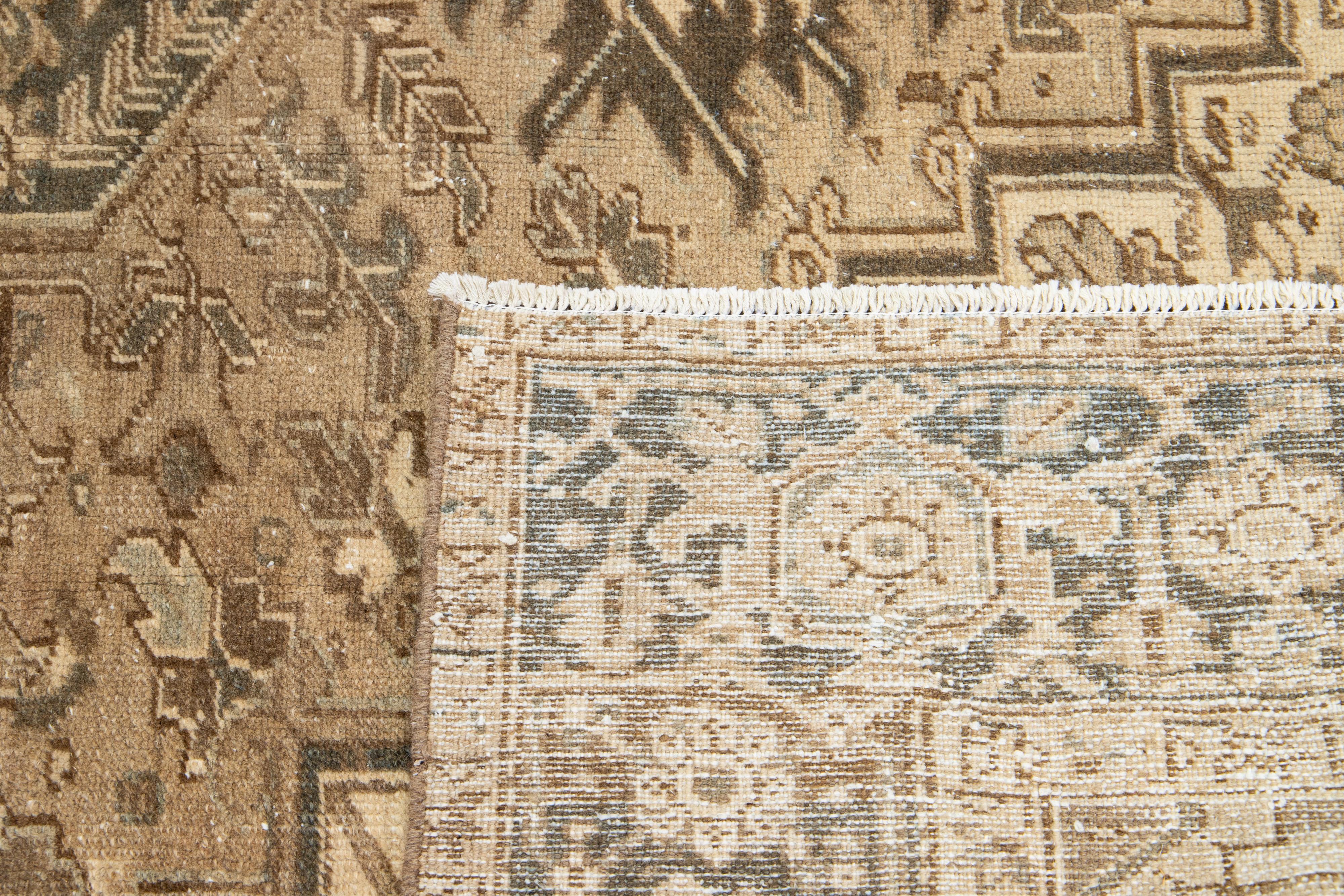 Heriz Serapi Brown Antique Persian Heriz Wool Rug Features a Medallion Motif From The 1920s  For Sale