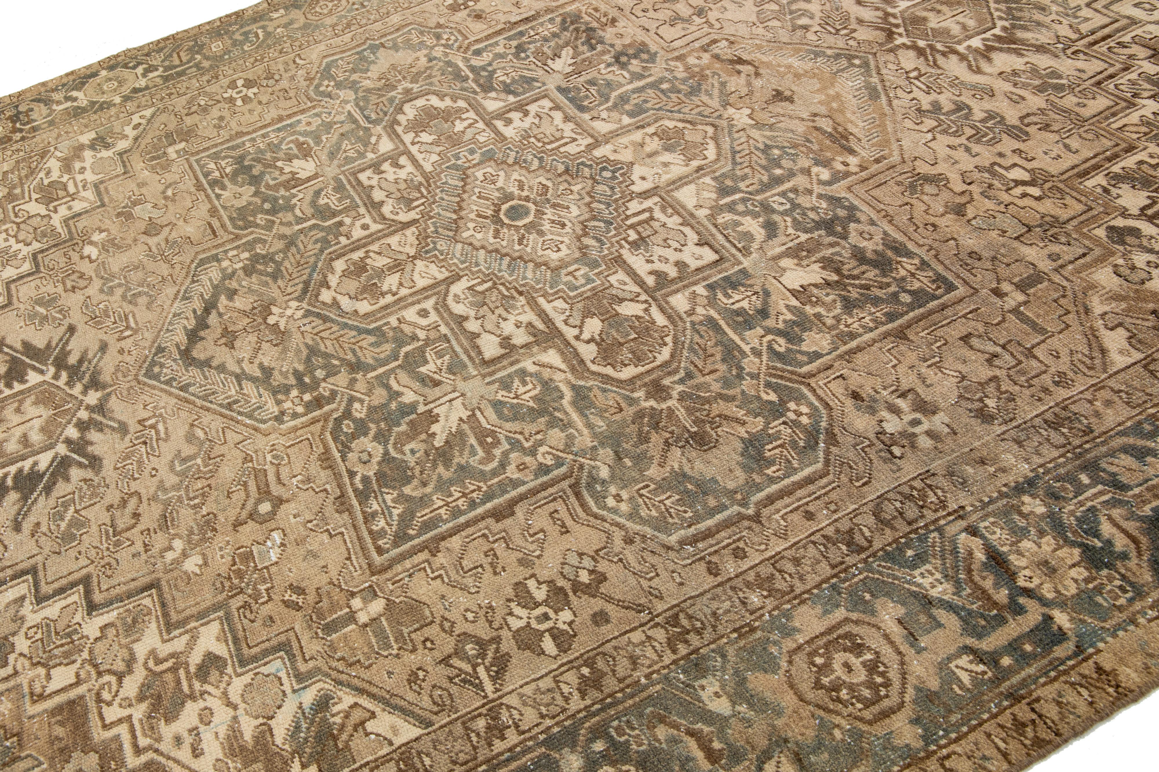 Brown Antique Persian Heriz Wool Rug Features a Medallion Motif From The 1920s  For Sale 2