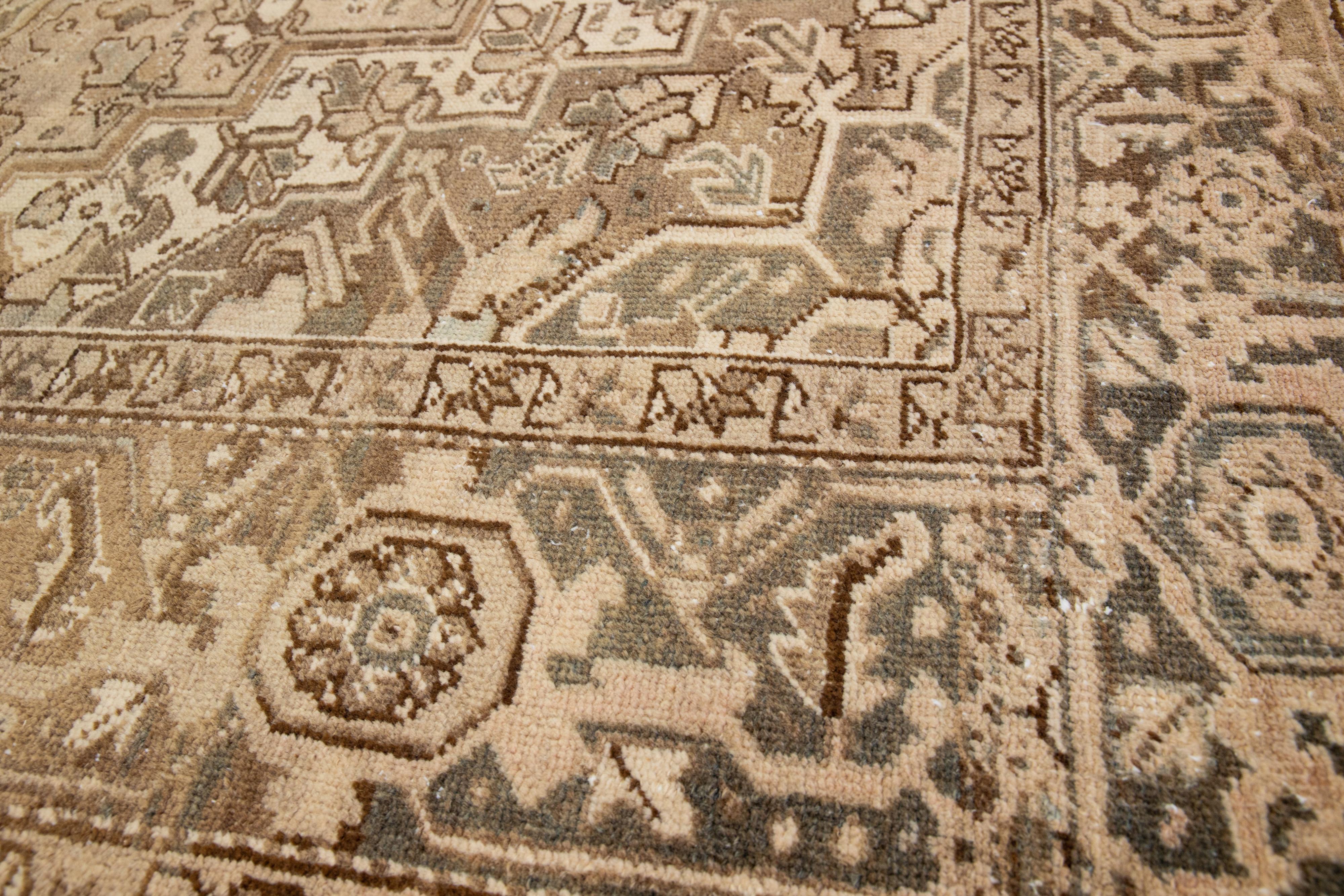 Brown Antique Persian Heriz Wool Rug Features a Medallion Motif From The 1920s  For Sale 3