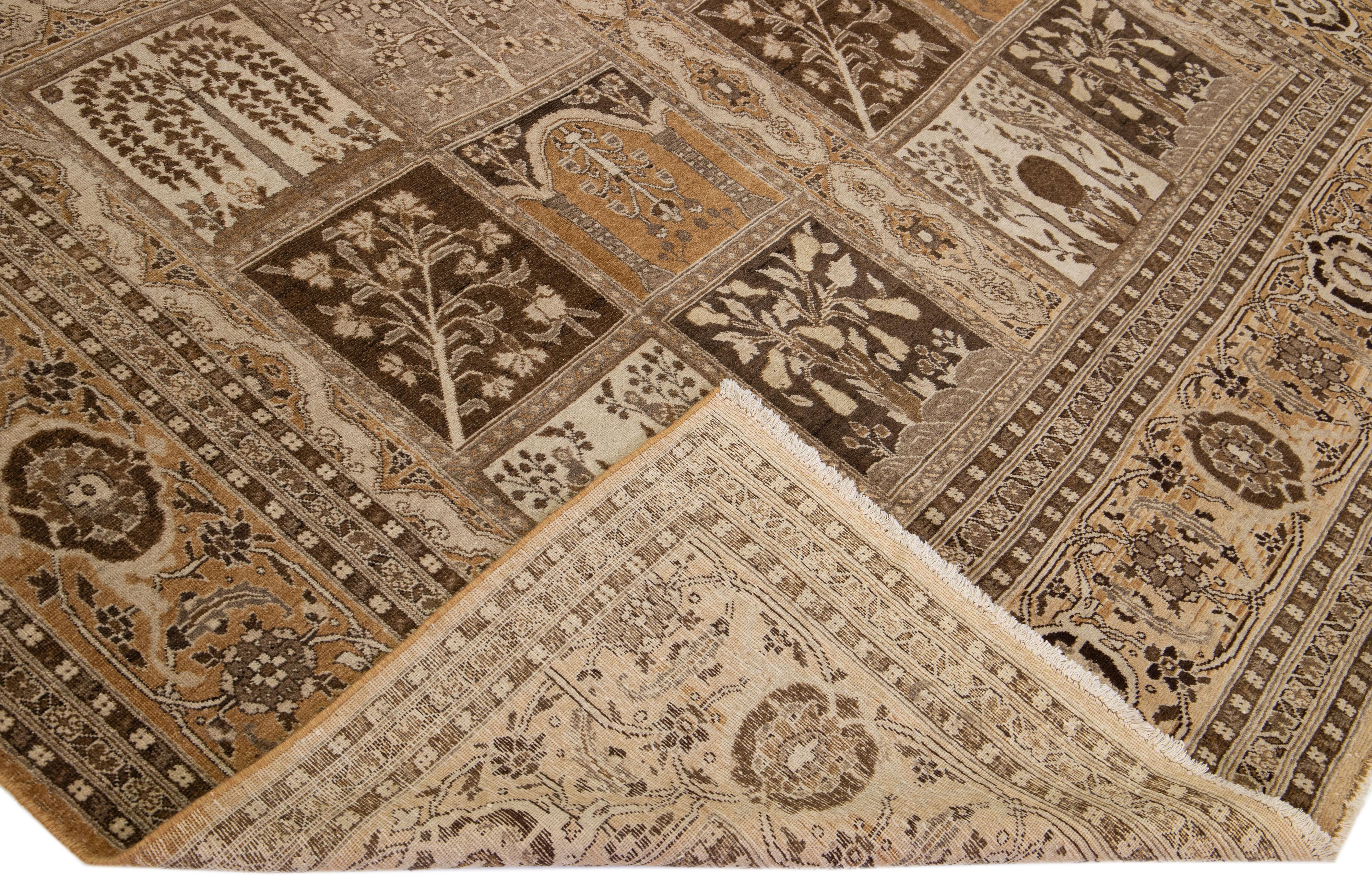 Beautiful antique Tabriz hand-knotted wool rug with a brown color field. This Persian rug has beige and tan accents in a gorgeous all-over geometric floral design.

This rug measures: 9'6