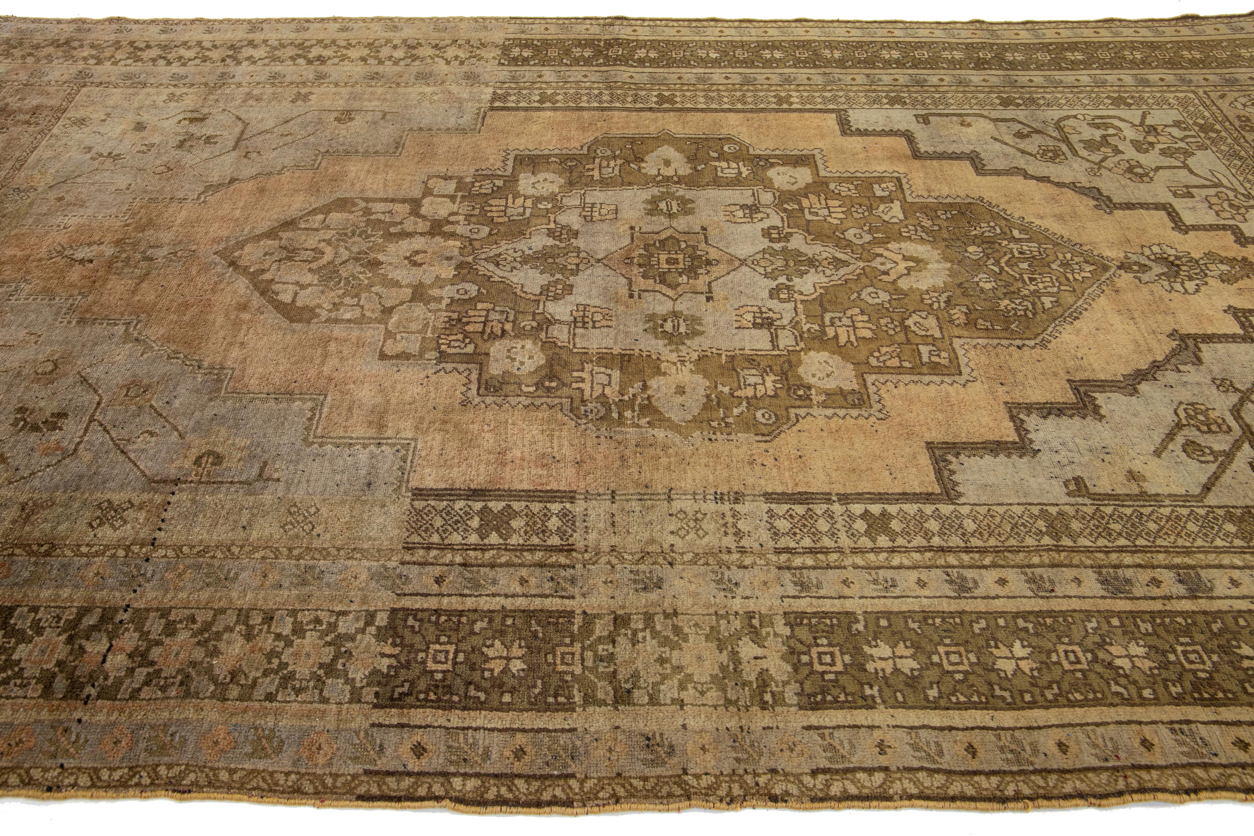 Brown Antique Turkish Khotan Wool Rug Handmade with Medallion Motif  In Good Condition For Sale In Norwalk, CT