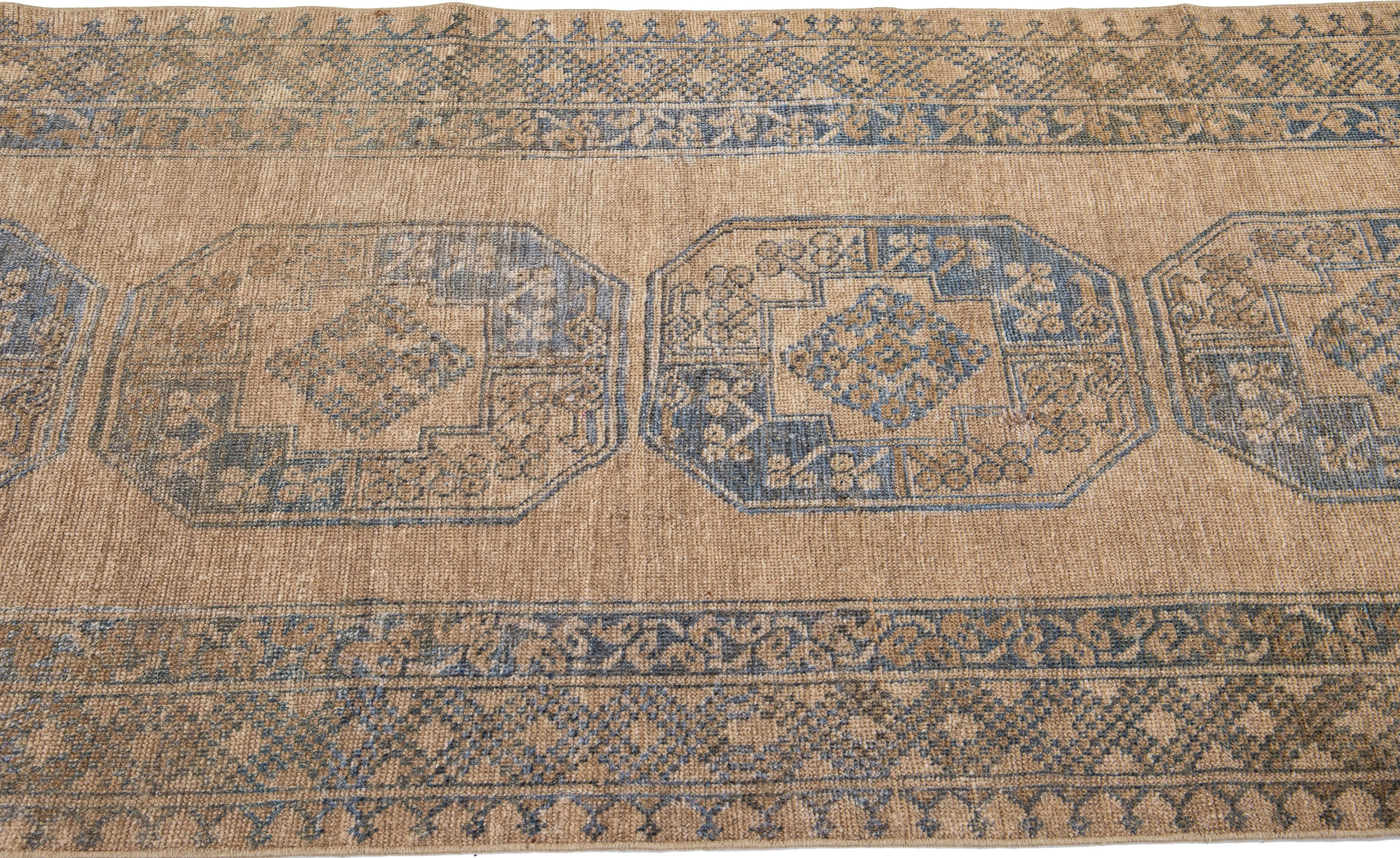 Hand-Knotted Brown Antique Turkmen Handmade Persian Wool Runner with Tribal Motif For Sale