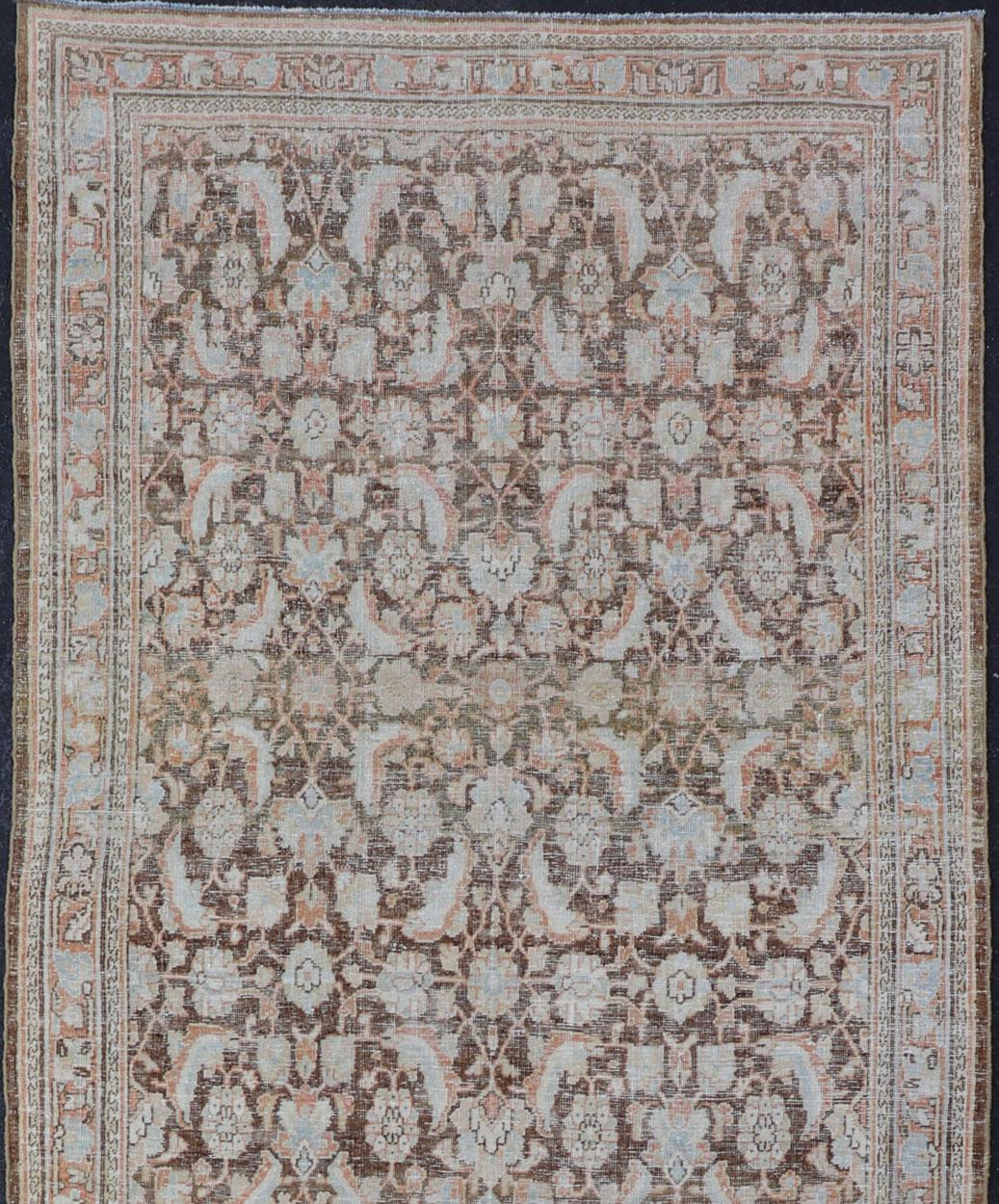 Antique Gallery Mahal gallery rug with colorful, bold design, Keivan Woven Ars / rug EMB-8536-178964, country of origin / type: Iran / Mahal, circa 1920

This antique Persian Mahal carpet features colors of browns and soft orange An all-over,