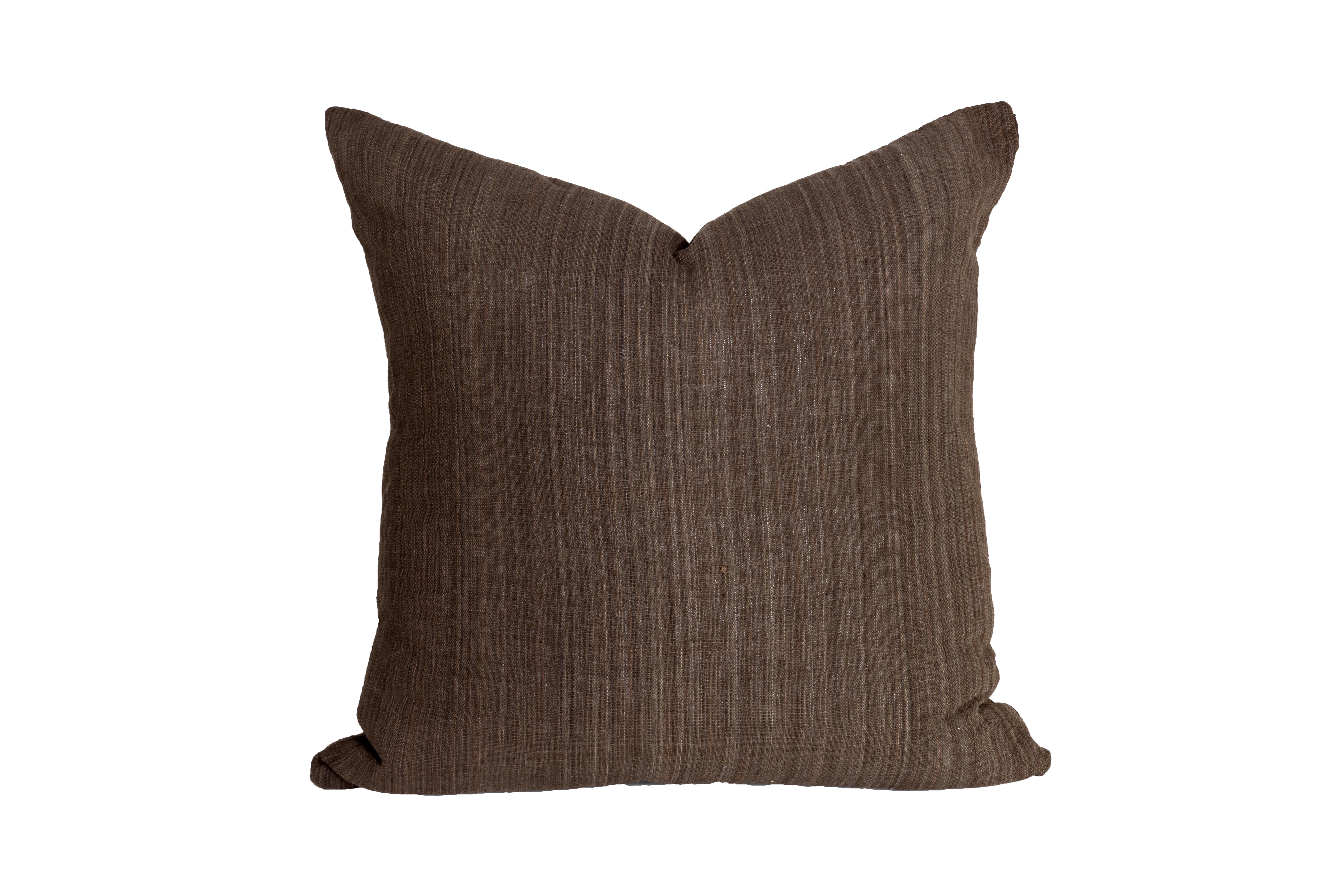 The Brown Bark Vintage Hmong Striped Textiles Down Filled Pillow is a great addition to any room. It's a muted, natural color that pairs well with almost any decor and comes in a soft linen brown textile texture that adds texture to your home. Comes