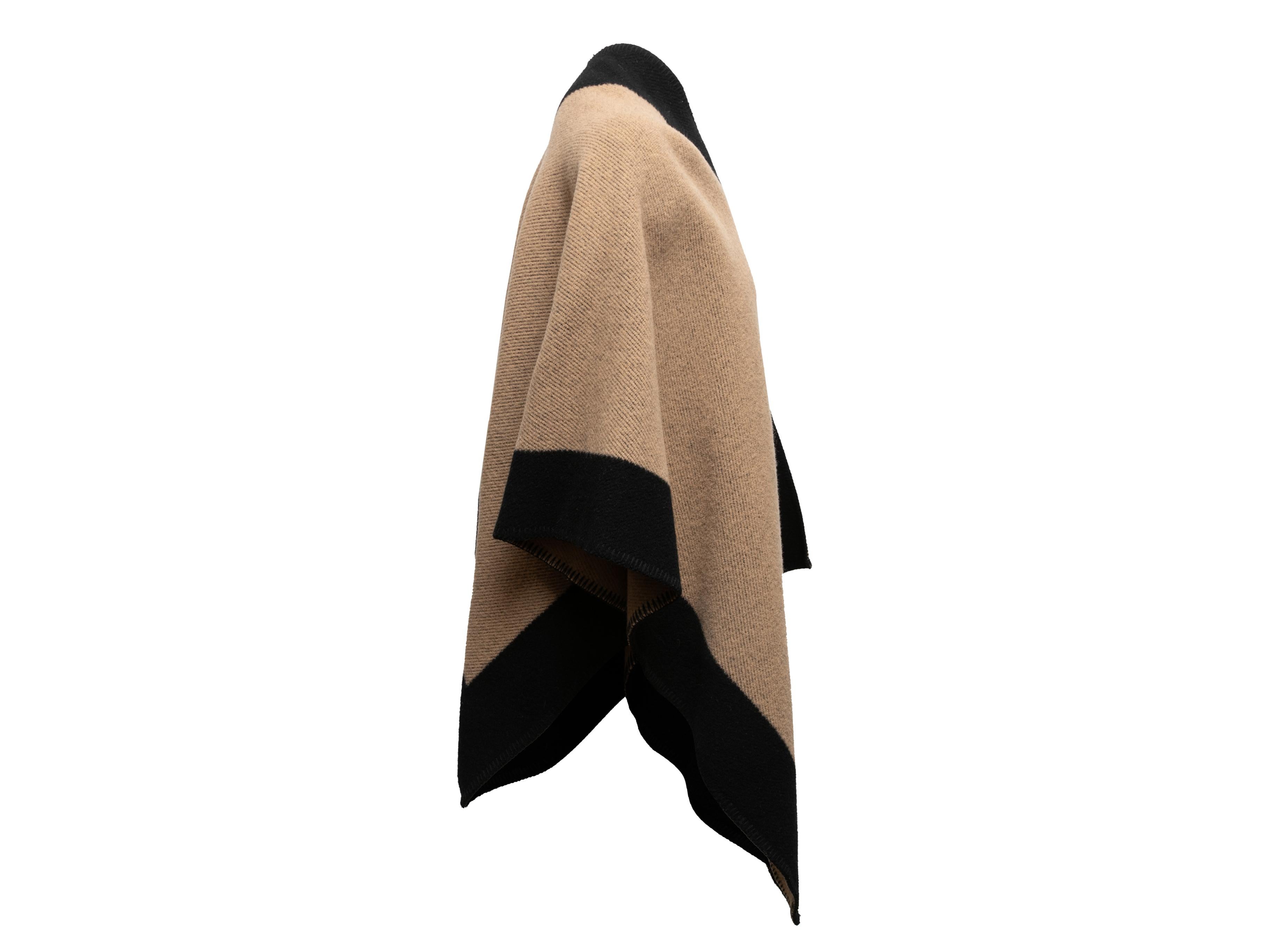 Brown and black knit cape shawl by Burberry. 74