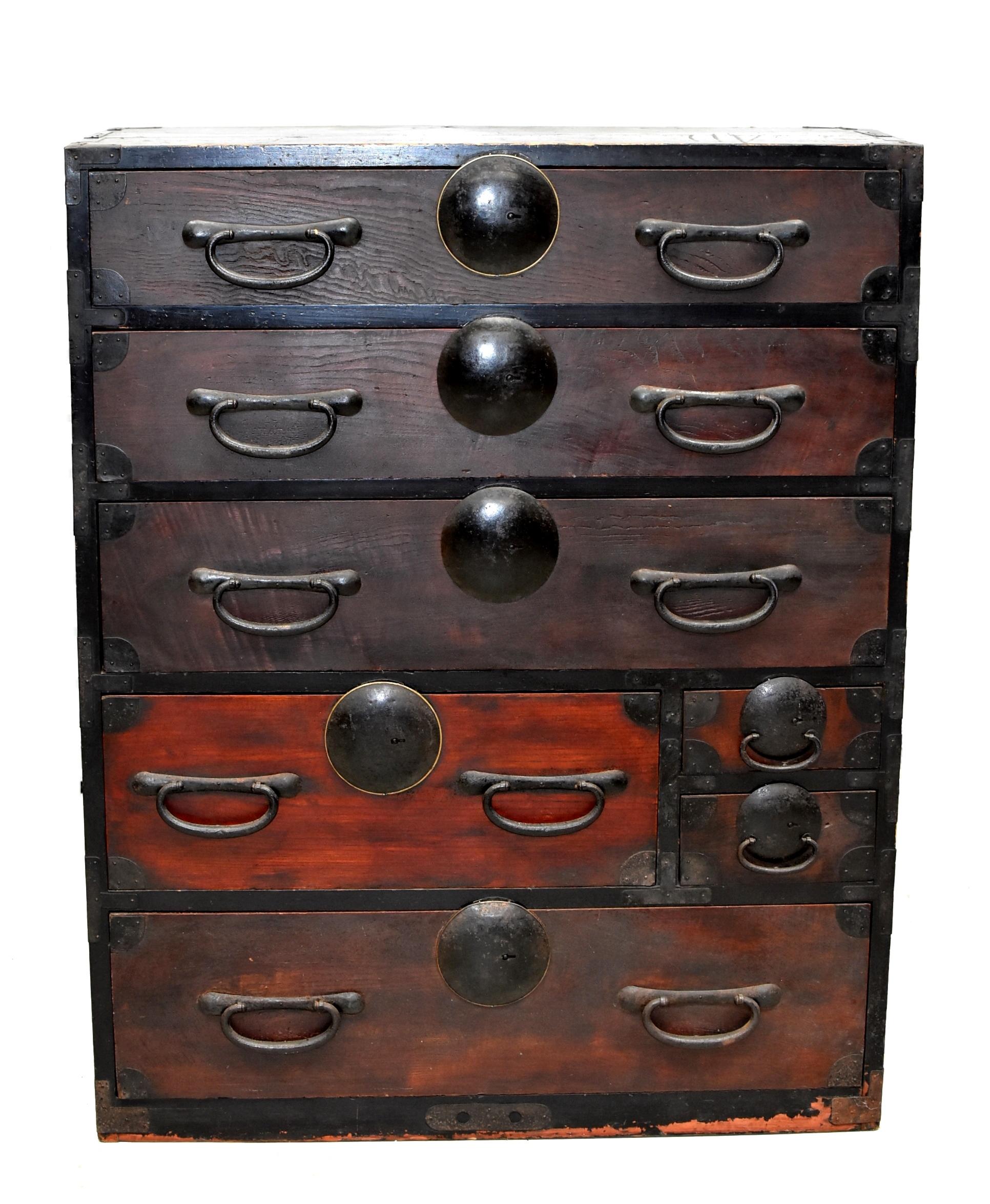 A beautiful vintage, Meiji Period, Japanese Tansu with seven full capacity drawers. Large, unique, solid iron and bronze hardware are simple and timeless. This piece is very similar to the other Black Tansu listed. They have the same design and