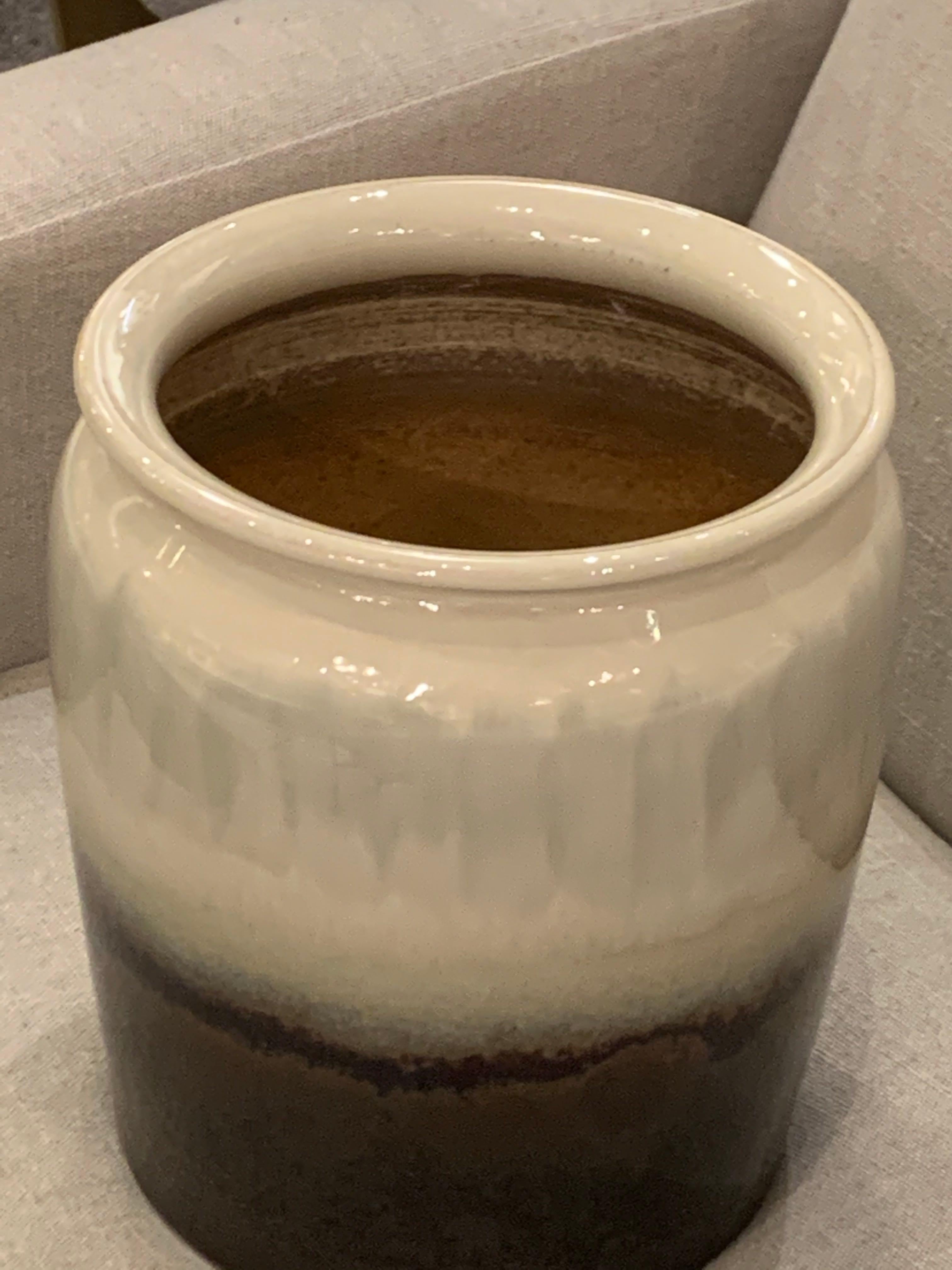 Contemporary Chinese ceramic pot with decorative drip glaze.
Dark brown/black base with horizontal color bands of taupe, sage and blue

  