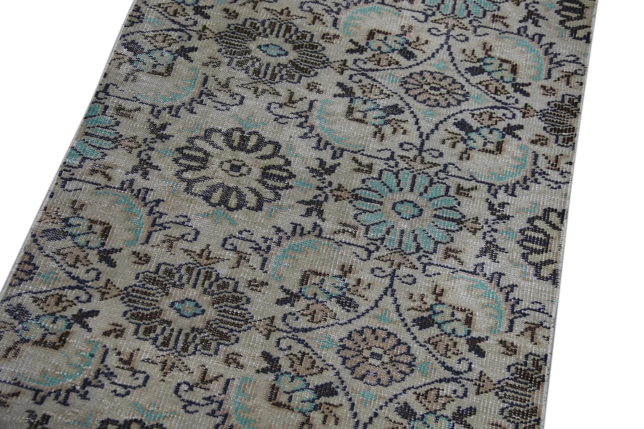 Introducing a one-of-a-kind vintage Turkish hand-knotted wool rug, carefully crafted by skilled artisans using traditional techniques passed down through generations. This exquisite rug boasts a stunning array of natural dyes, resulting in a rich