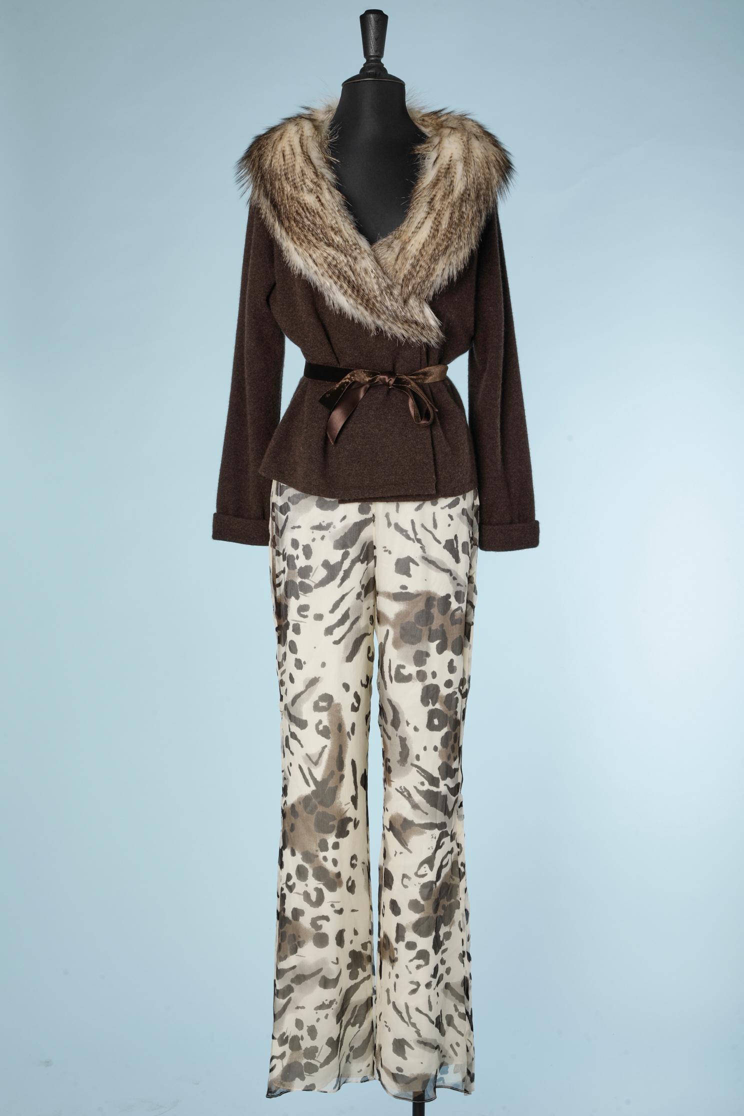 Brown cashmere and furs collar cardigan with velvet ribbon belt. Chiffon printed trousers pleated on the side of the legs. 
Double lays of cashmere and snap to close it. 
SIZE 10
