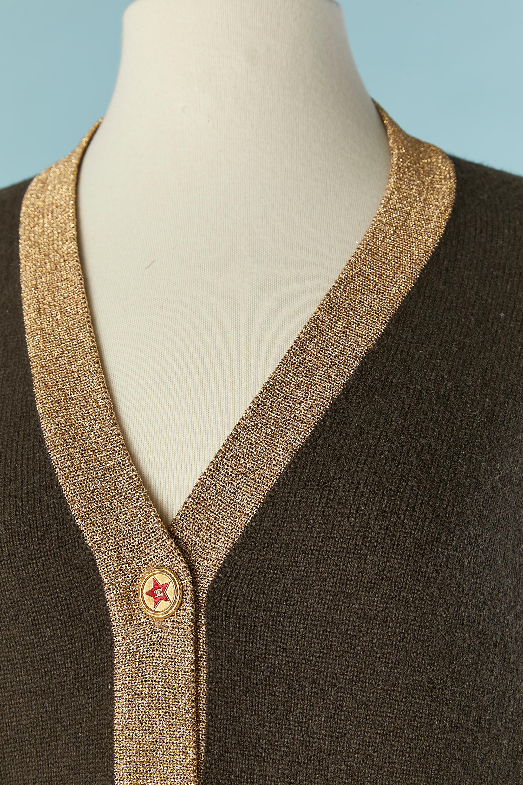Brown cashmere cardigan with gold lurex knit edge and branded buttons. Knit composition: 88% cashmere, 12% polyamide. 
Pocket on both side. 
SIZE 44 (Fr) L 