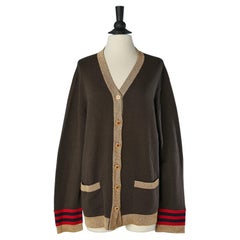 Brown cashmere cardigan with gold lurex knit edge and branded buttons CHANEL