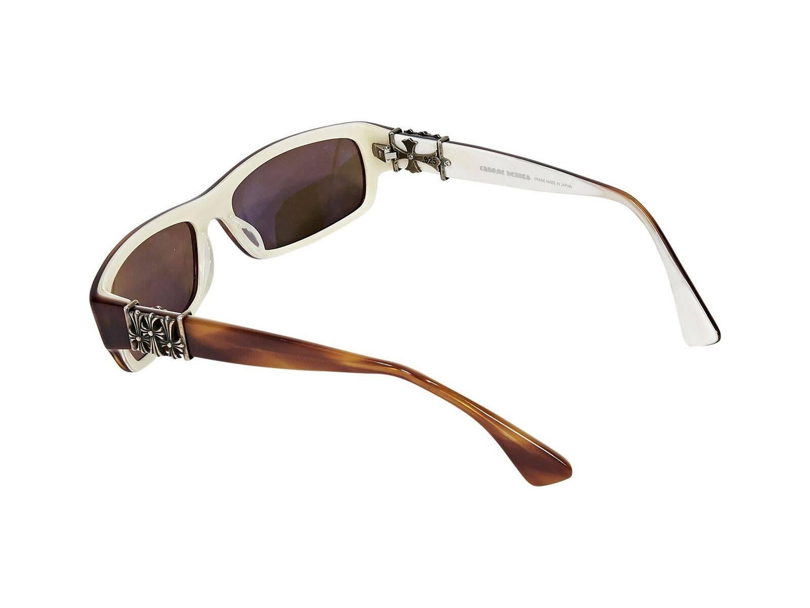 Product details:  Brown small rectangular sunglasses by Chrome Hearts.  Logo detail at temples.  White interior.  1.25