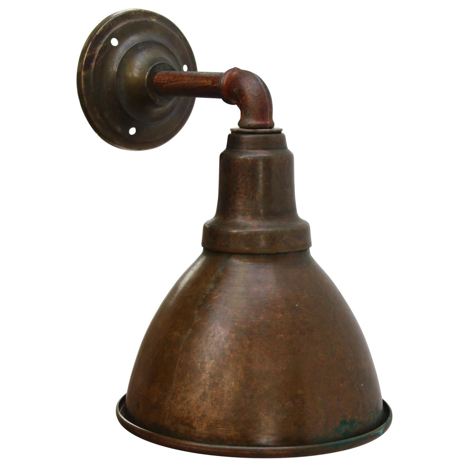 Industrial wall light made of copper, cast iron arm with brass wall plate.

Diameter cast iron wall piece: 10 cm, 3 holes to secure

Weight: 1.80 kg / 4 lb

Priced per individual item. All lamps have been made suitable by international