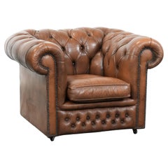 Used Brown cowhide leather chesterfield armchair in English style on wheels