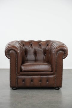 Poltrona club Chesterfield in pelle di vacchetta marrone in stile inglese