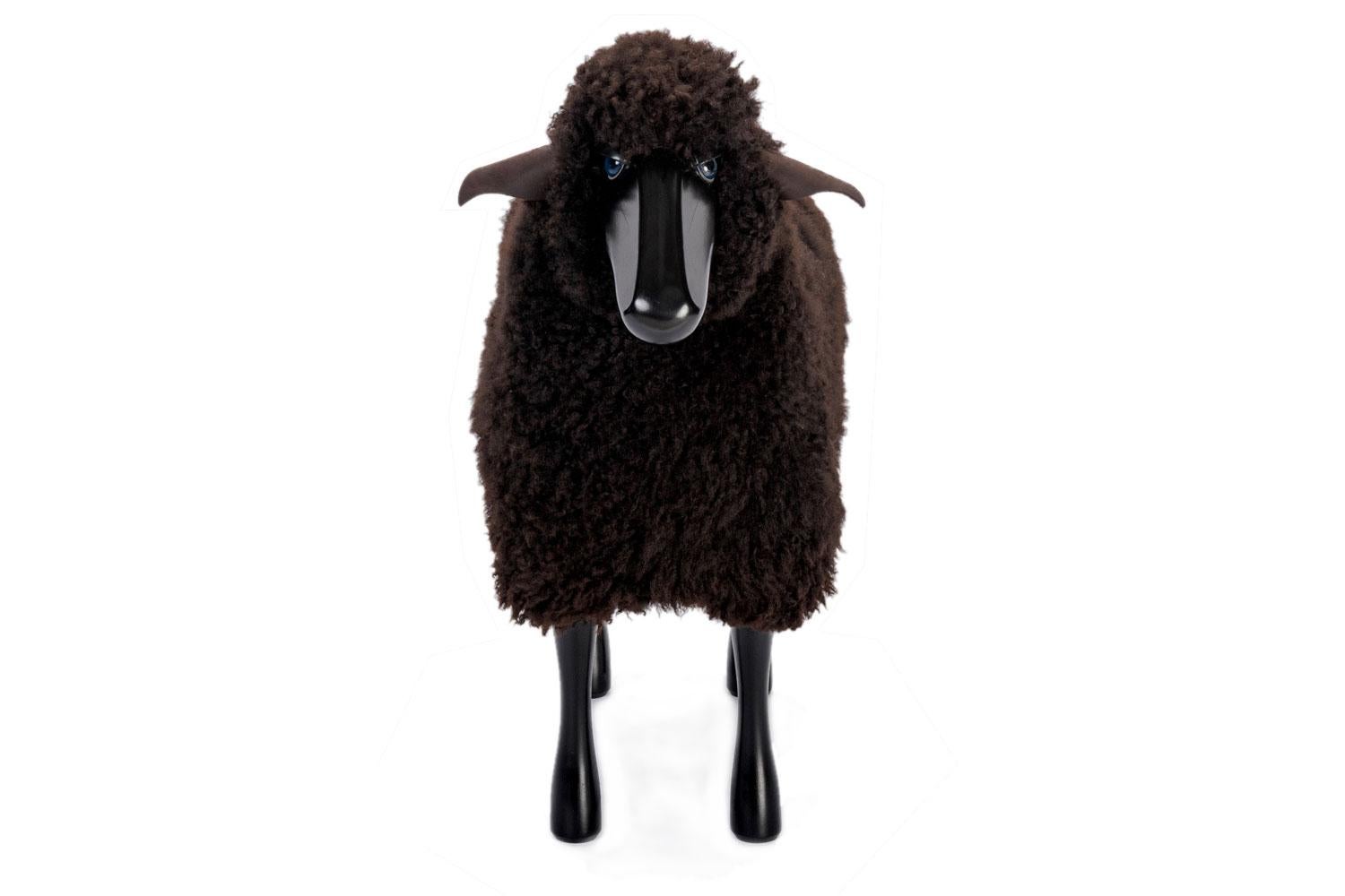 Brown wool small sheep

This small with real sheepskin on black stained beechwood and natural leather ears is suitable as original seating, ottoman or for decoration. Use as a stool for example, around a dining table the back of the sheep is extra