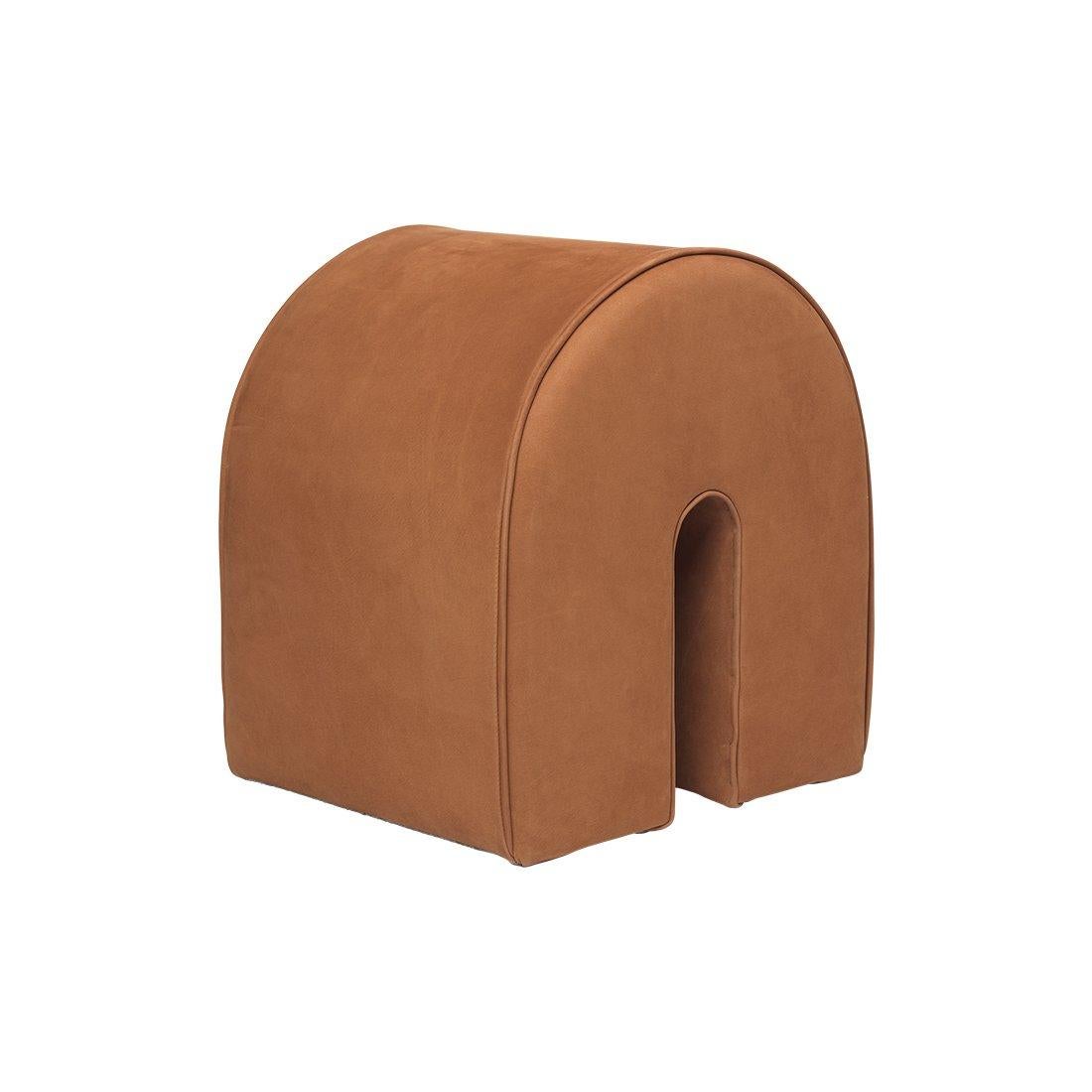 Brown curved pouf by Kristina Dam Studio.
Materials: Brown Aniline Nubuck. 
Also available in other colors. 
Dimensions: 36 x 42 x H 42cm.

The Modernist furniture collection takes notions of modern design and yet the distinctive design touch