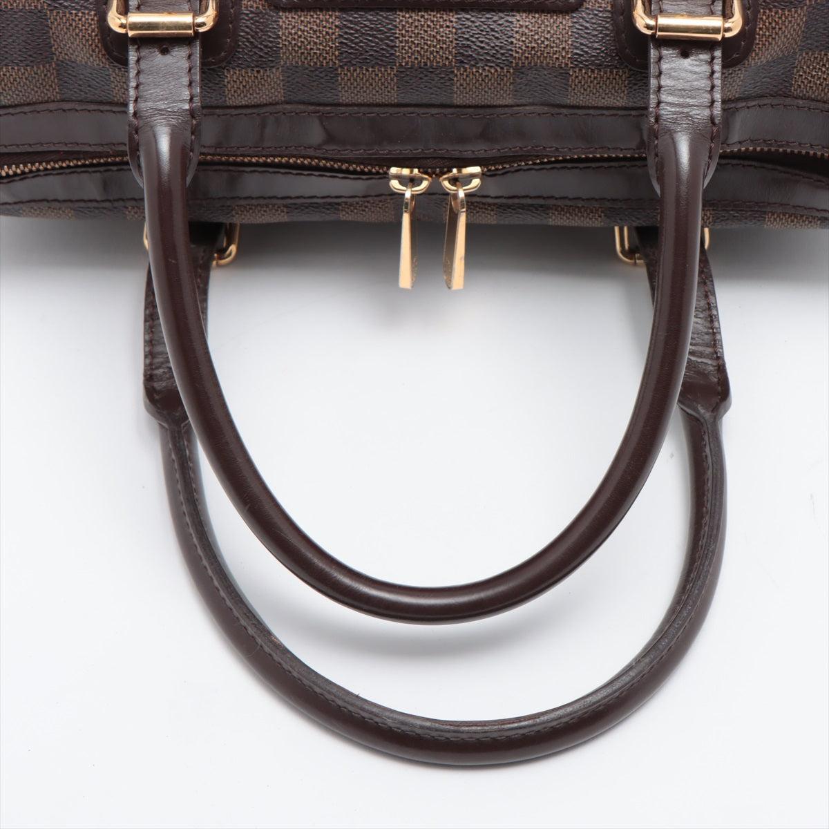 lv bag with gold plate