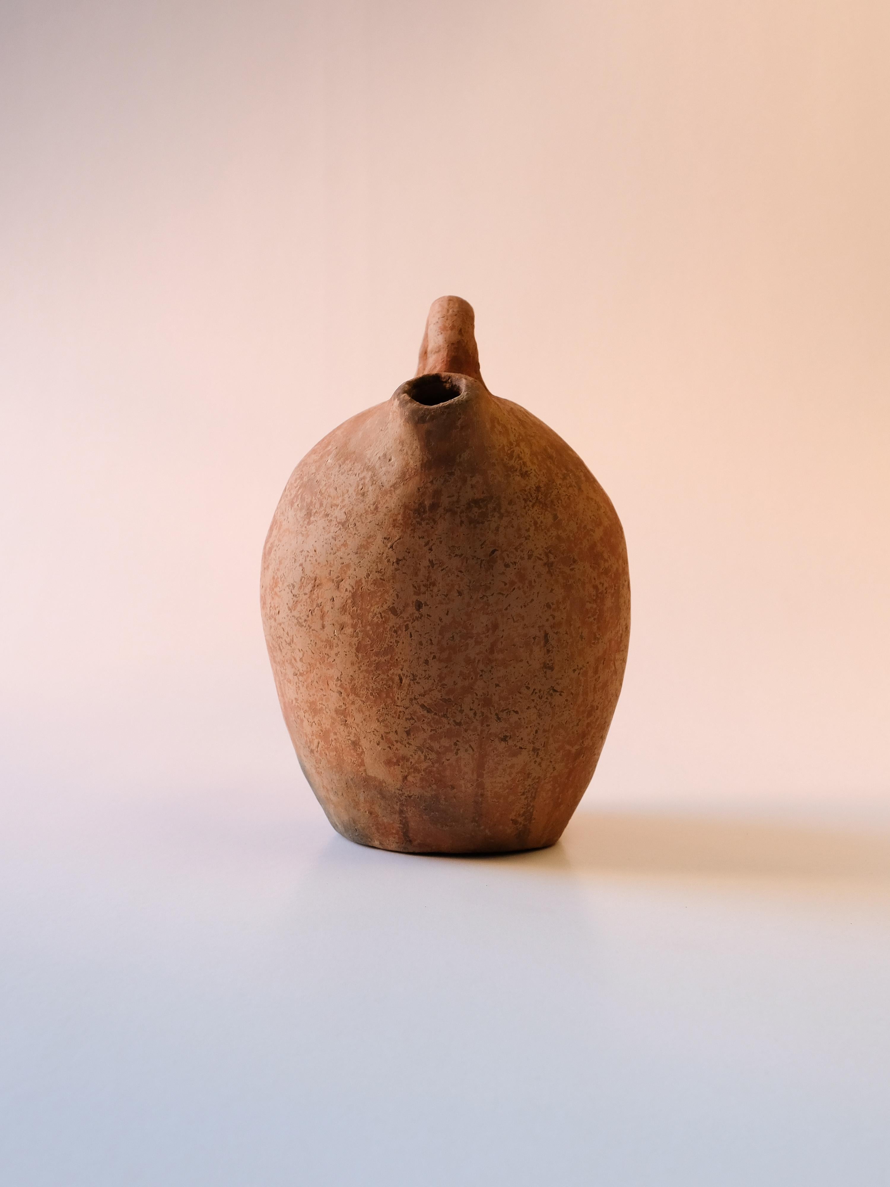 - Handbuilt brown small decorative pot 
- made of clay collected from the potter's surroundings.
- made in the Moroccan Rif mountains by the potter Fatima.

Approximate measurements: 7 x 7 x 8 in // 18 x 18 x 20 cm; 

Handmade: Variation is to