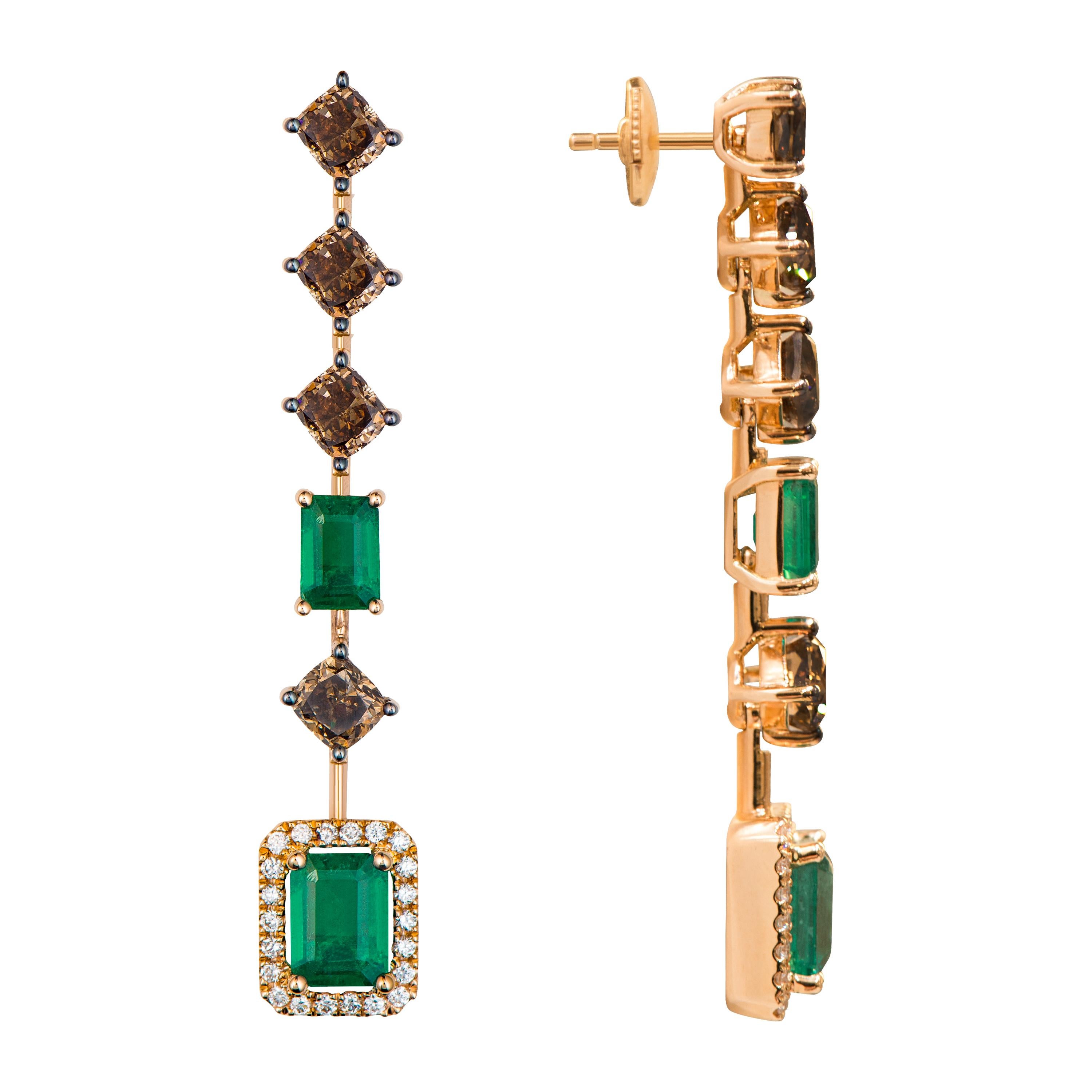 Diagonally set brown diamonds are matched with emeralds in these hand crafted rose gold . The final emeralds at the end of the earrings are further accented with round brilliant diamonds. This is a perfect jewellery for the fall season with its soft