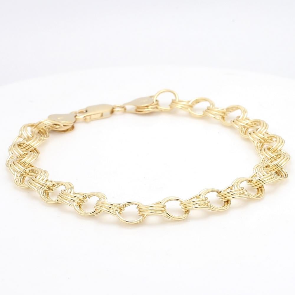 Bracelet à breloques en spirale à diamants bruns avec pierre centrale sertie d'un chaton Excellent état - En vente à Scottsdale, AZ
