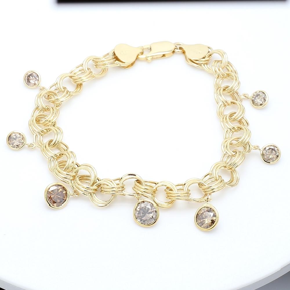 Bracelet à breloques en spirale à diamants bruns avec pierre centrale sertie d'un chaton Pour femmes en vente