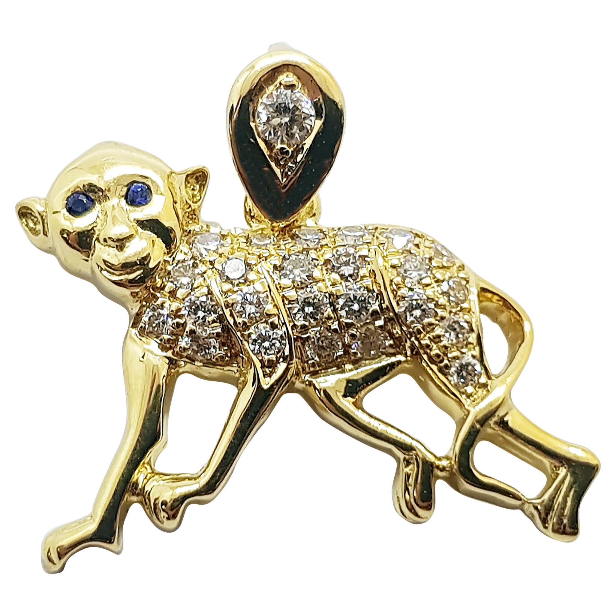 Pendentif chinois du zodiaque en or 18 carats avec diamant brun et saphir bleu représentant un singe  en vente