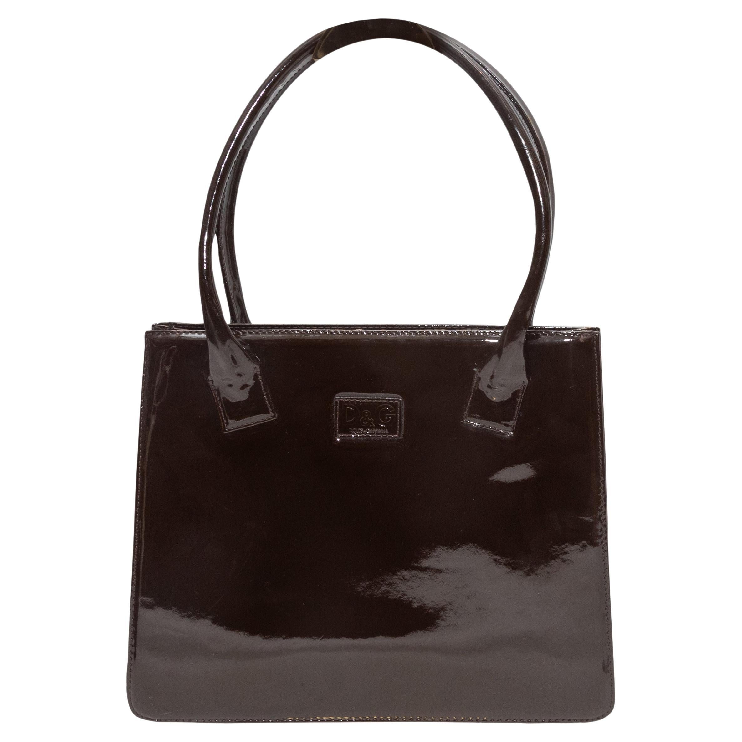 Borsetta in pelle verniciata marrone Dolce & Gabbana