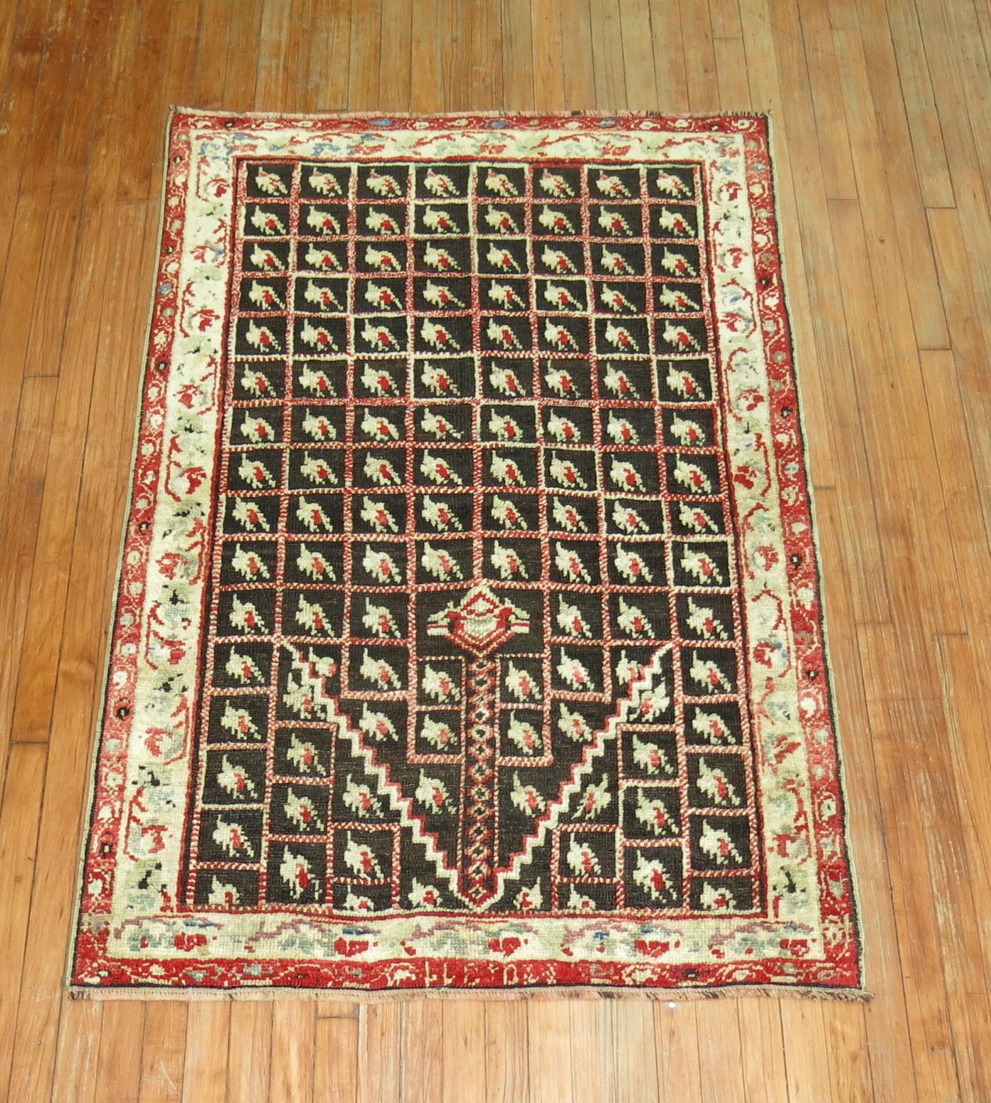 A one of a kind antique Turkish Ghiordes scatter size rug from the early 20th century.

Measures: 3'7'' x 5'4''.