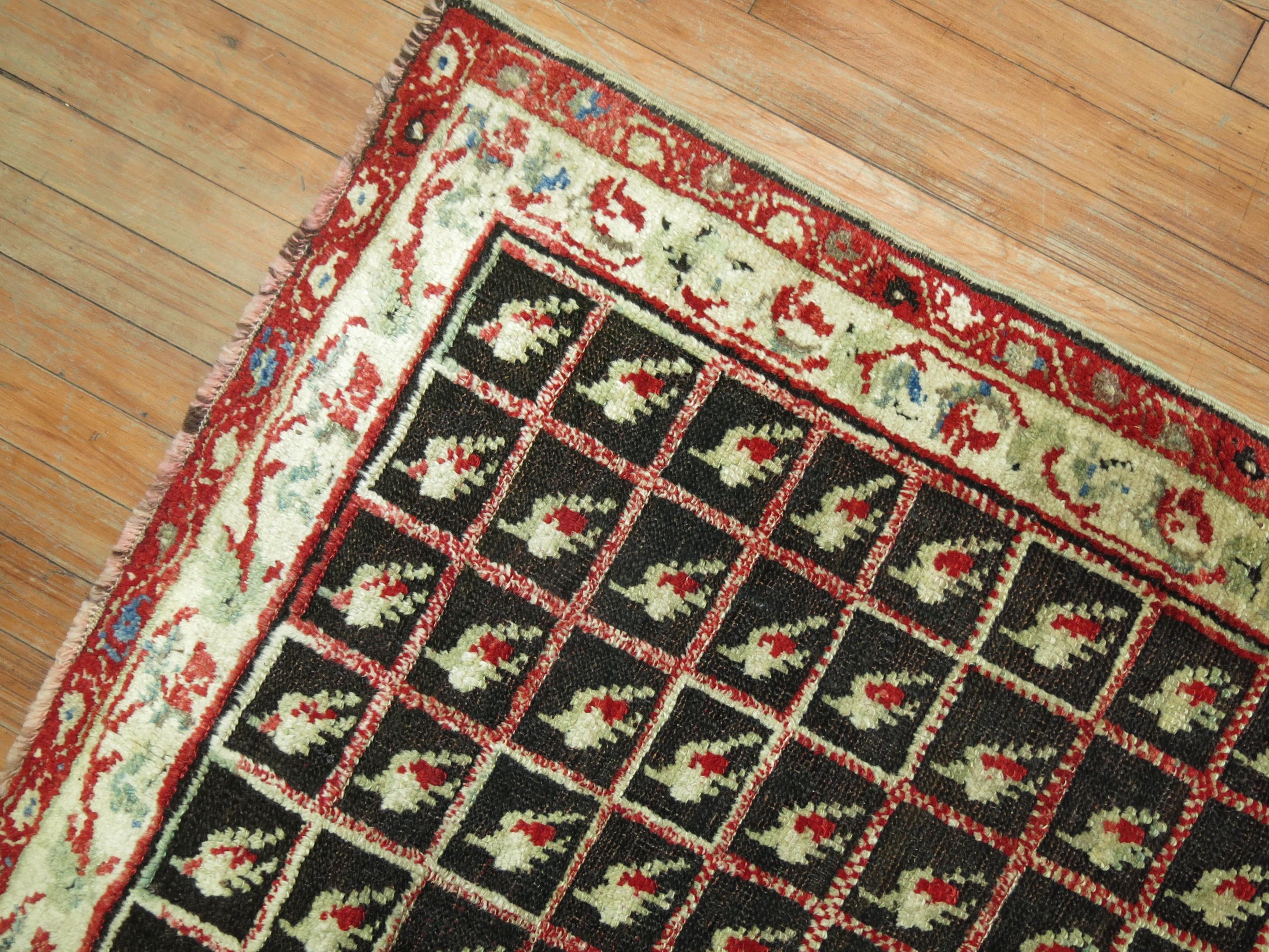 Islamic Brown Early 20th Century Antique Turkish Ghiordes Rug For Sale