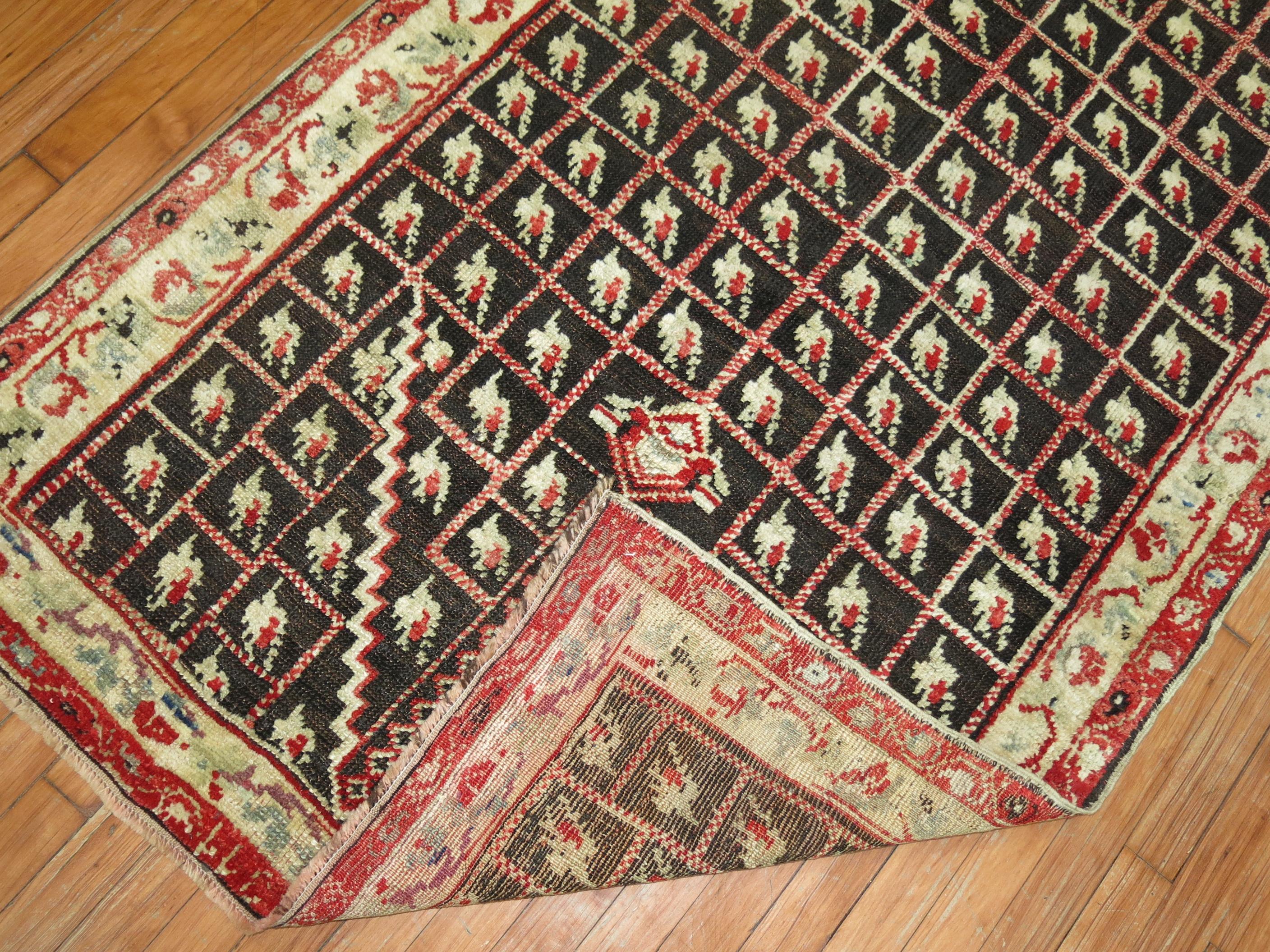 Brown Early 20th Century Antique Turkish Ghiordes Rug In Good Condition For Sale In New York, NY