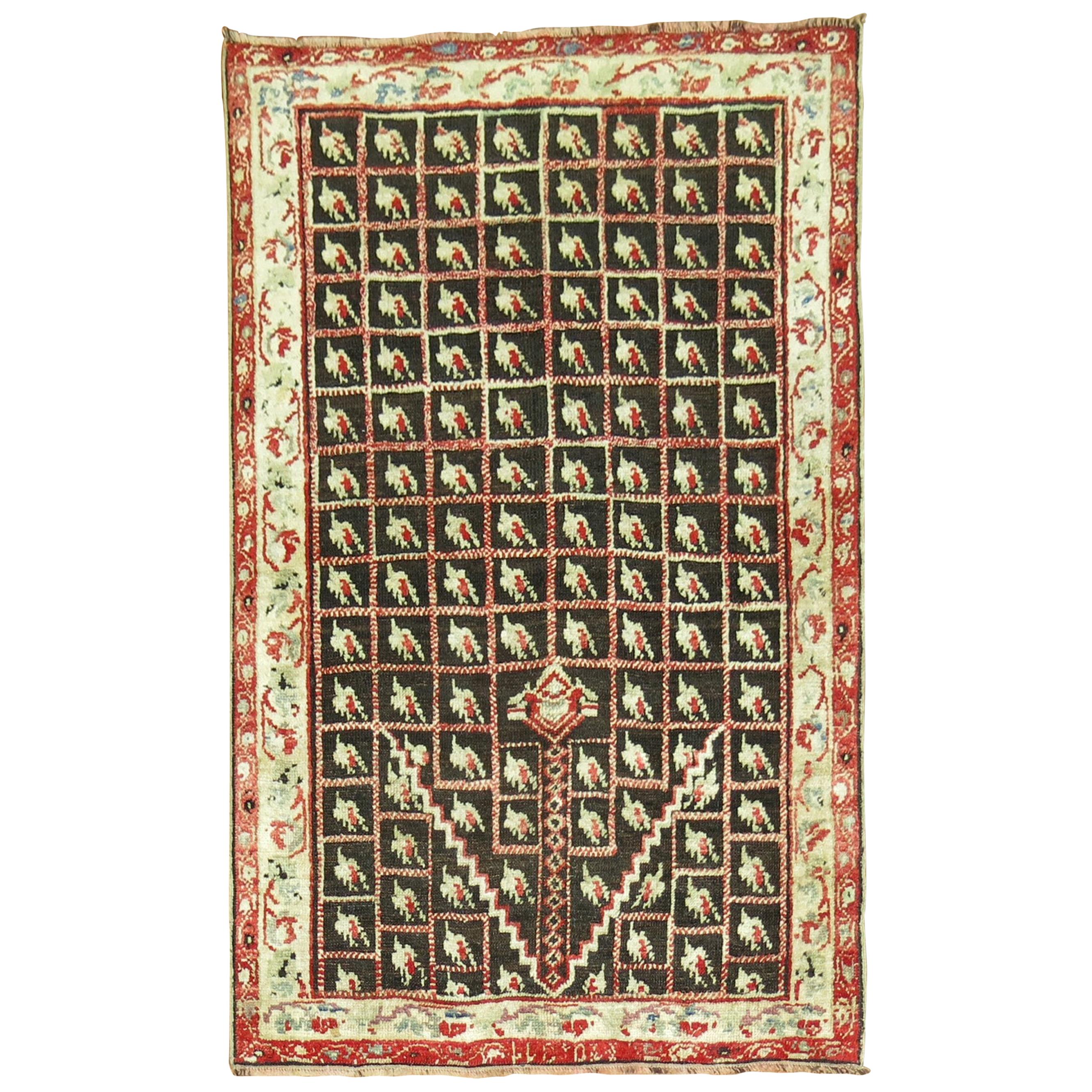 Brown Early 20th Century Antique Turkish Ghiordes Rug