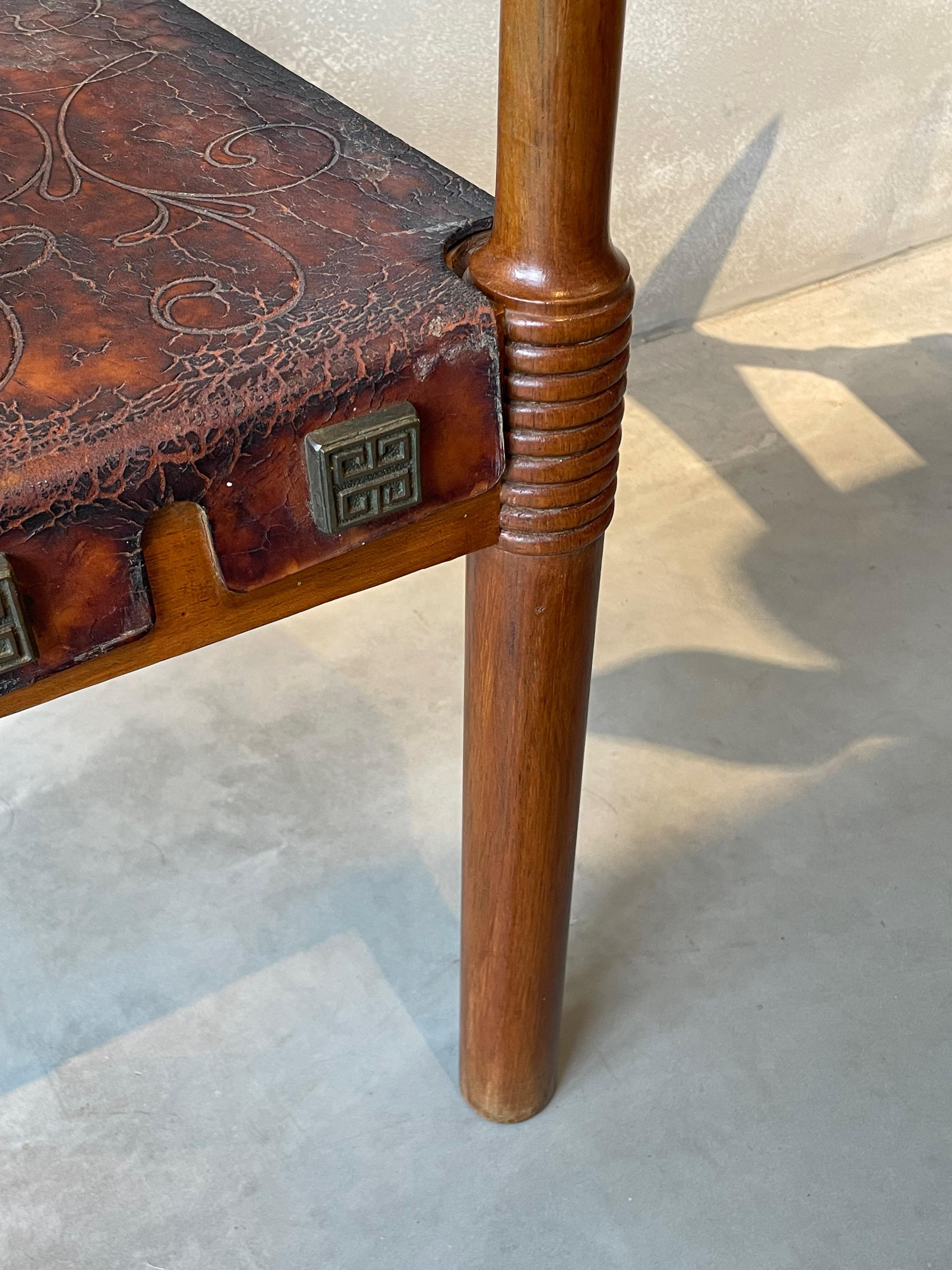 Late 20th Century Brown Embossed Leather And Carved Wood Pair Arm Chairs, Spain, 1970s For Sale