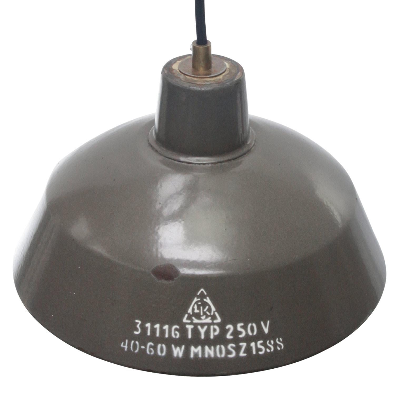Small industrial pendant
Brown enamel white interior
2 meter black cotton wire

Weight: 1.00 kg / 2.2 lb

Priced per individual item. All lamps have been made suitable by international standards for incandescent light bulbs, energy-efficient