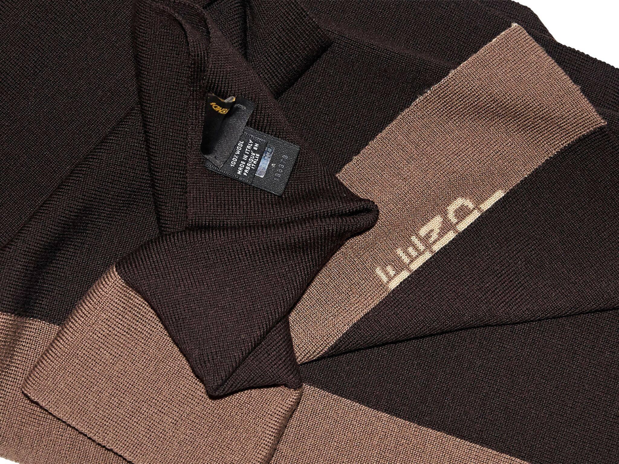 Product details:  Tonal brown wool scarf by Fendi.  63