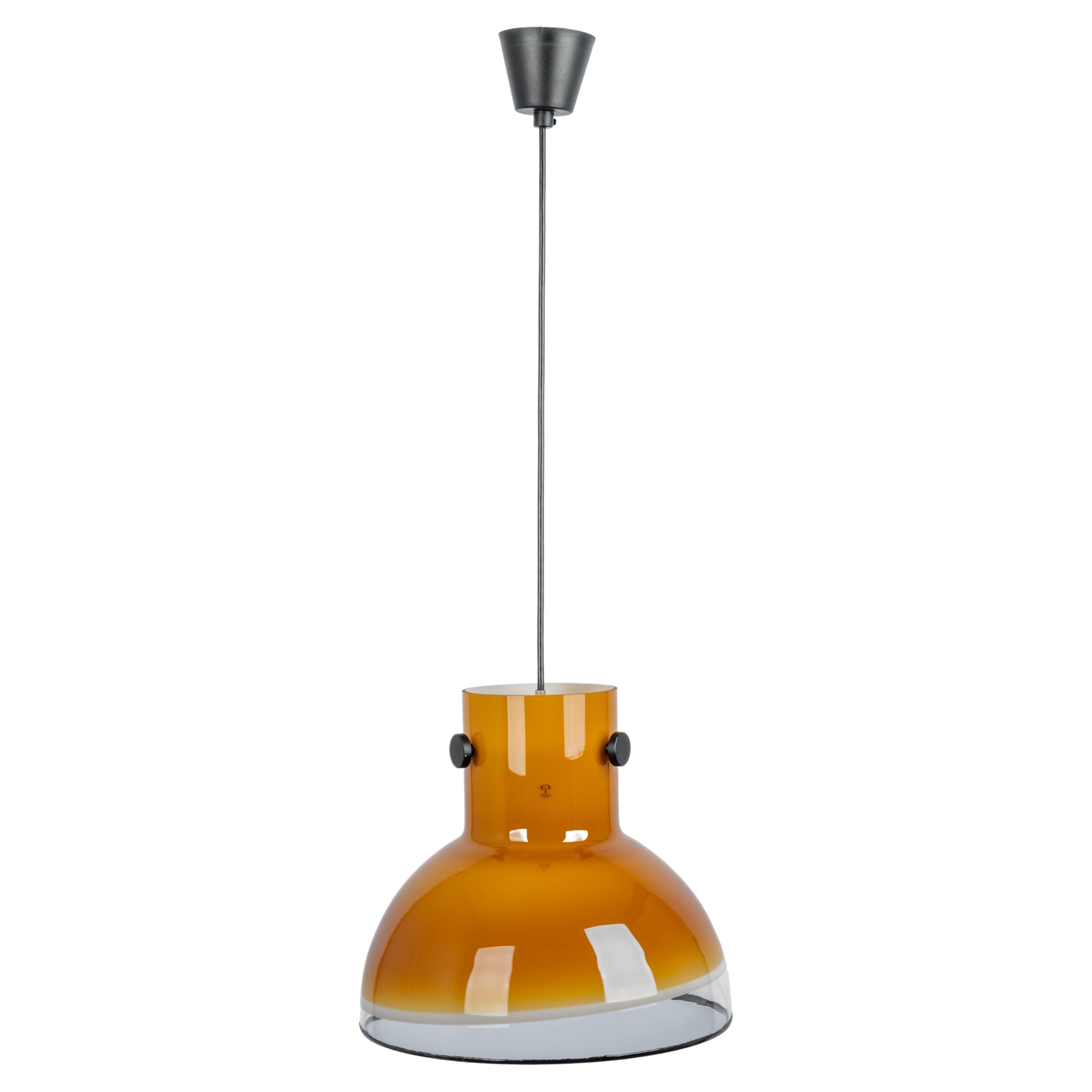 Light brown glass pendant light by Peill & Putzler, manufactured in Germany, circa the 1970s.
Wonderful light effect.
High quality and in very good condition. Cleaned, well-wired, and ready to use. 
The fixture requires 1 x E27 Standard bulbs