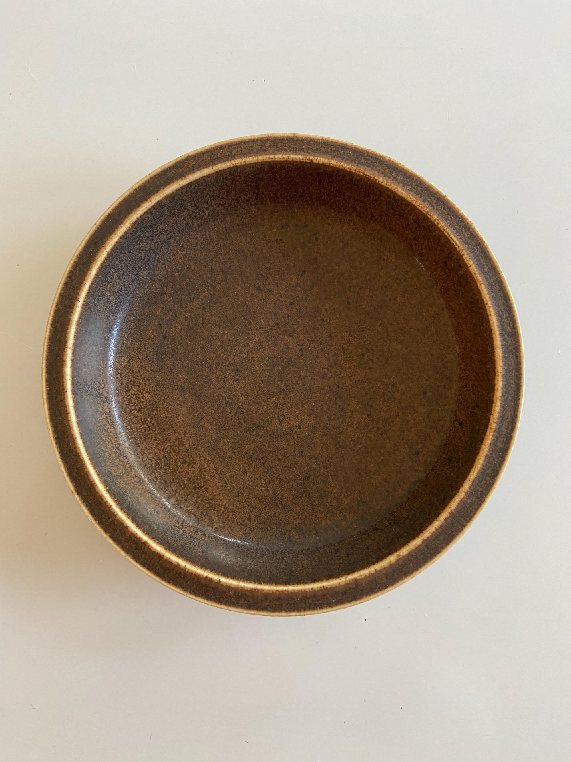 Saxbo Yin yang stamp No. 66 ceramic dish or bowl brown glaze.
 