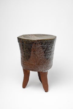 Brown glazed ceramic tripod table or stool by Marie-Lucie Trinquand, 2025.