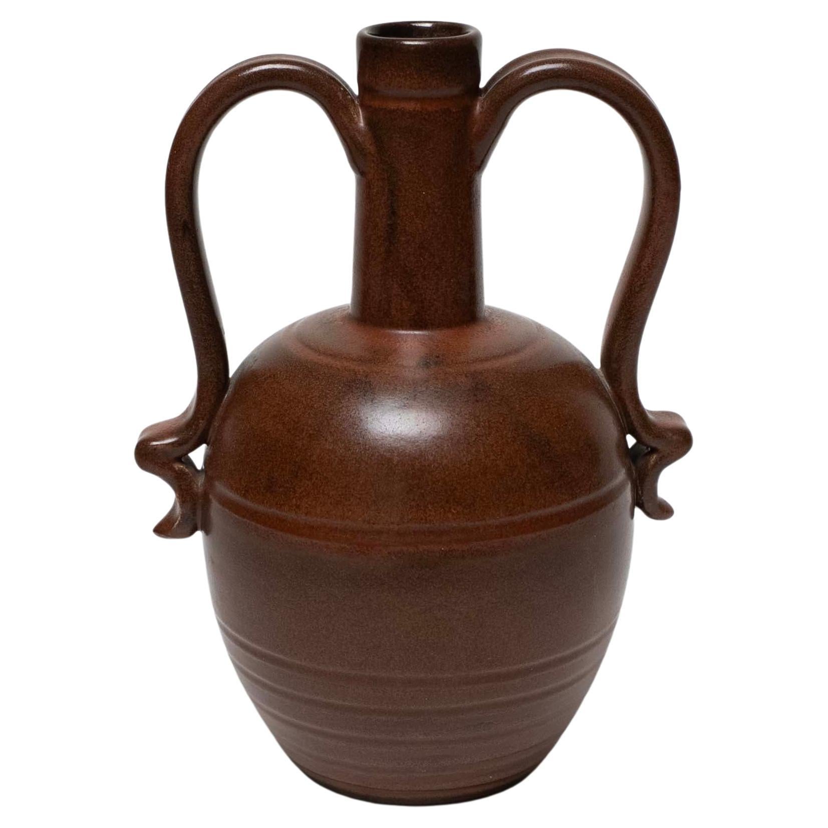 Glazed Ceramic Vase by Eva Jancke Björk for Upsala Ekeby, Sweden, c. 1940

Stately brown glazed ceramic vase by celebrated Swedish ceramicist Eva Jancke Björk.

-

Materials: Glazed Ceramic 
Dimensions: H 7.5