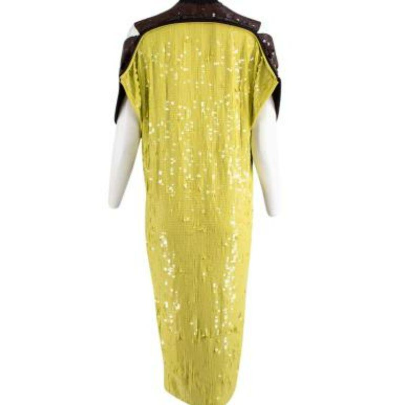 Bottega Veneta Brown & Green Sequin Long Dress
 
 
 
 - Mid weight body
 
 - Brown sequin front panel 
 
 - Contrasting lime green back sequin panel 
 
 - Ribbed neckline 
 
 - Cut out neck panels 
 
 - Loose fitting 
 
 
 
 Materials:
 
 100%