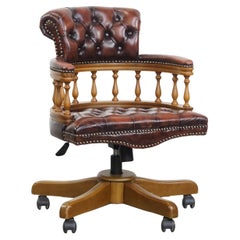 Brown height-adjustable Chesterfield office chair in cowhide leather